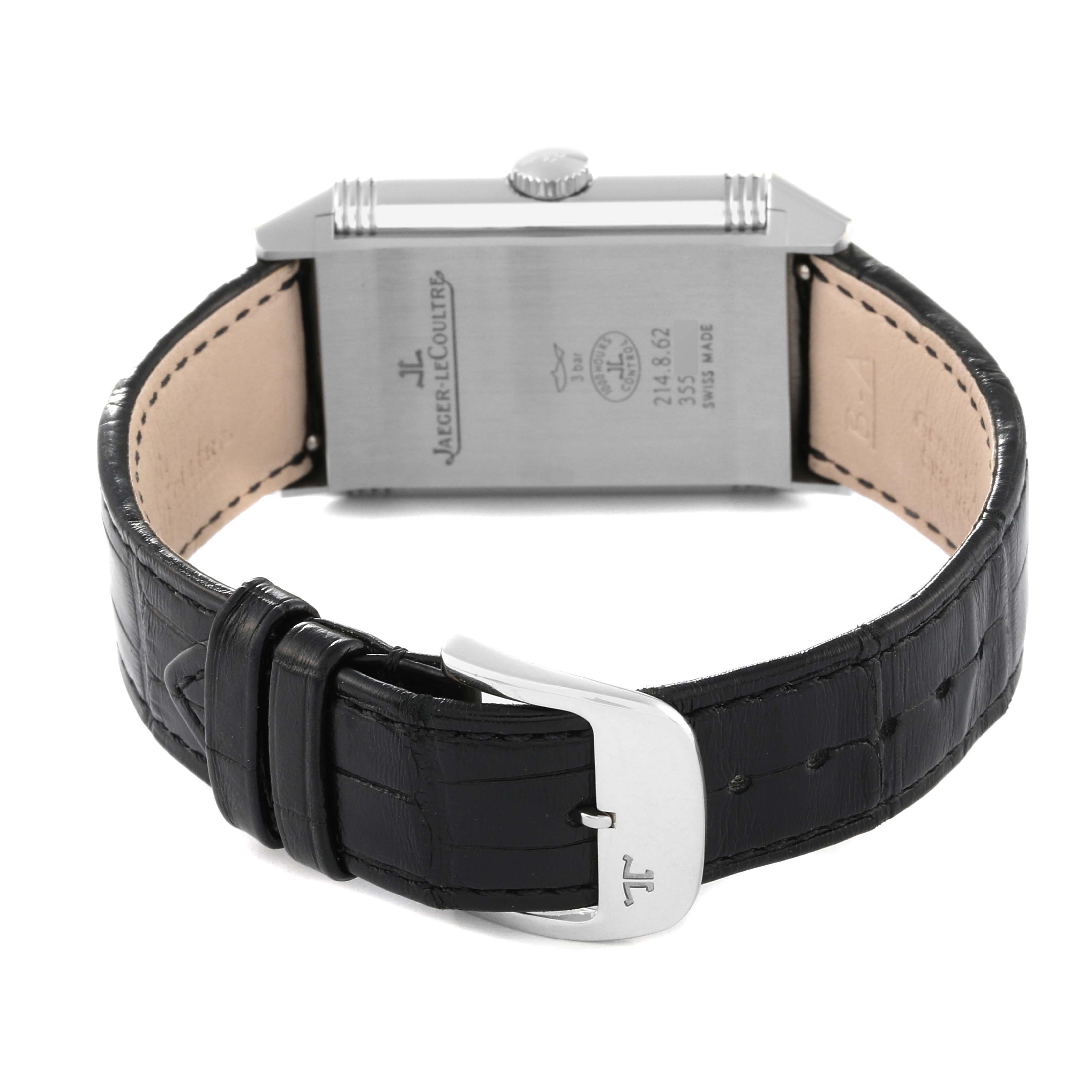 This Jaeger LeCoultre Reverso Q3858520 Men
s Stainless Steel Silver Dial Q3858520 Men
s Stainless Steel Silver Dial watch is shown from the back, highlighting its case back, crown, and leather strap with buckle.