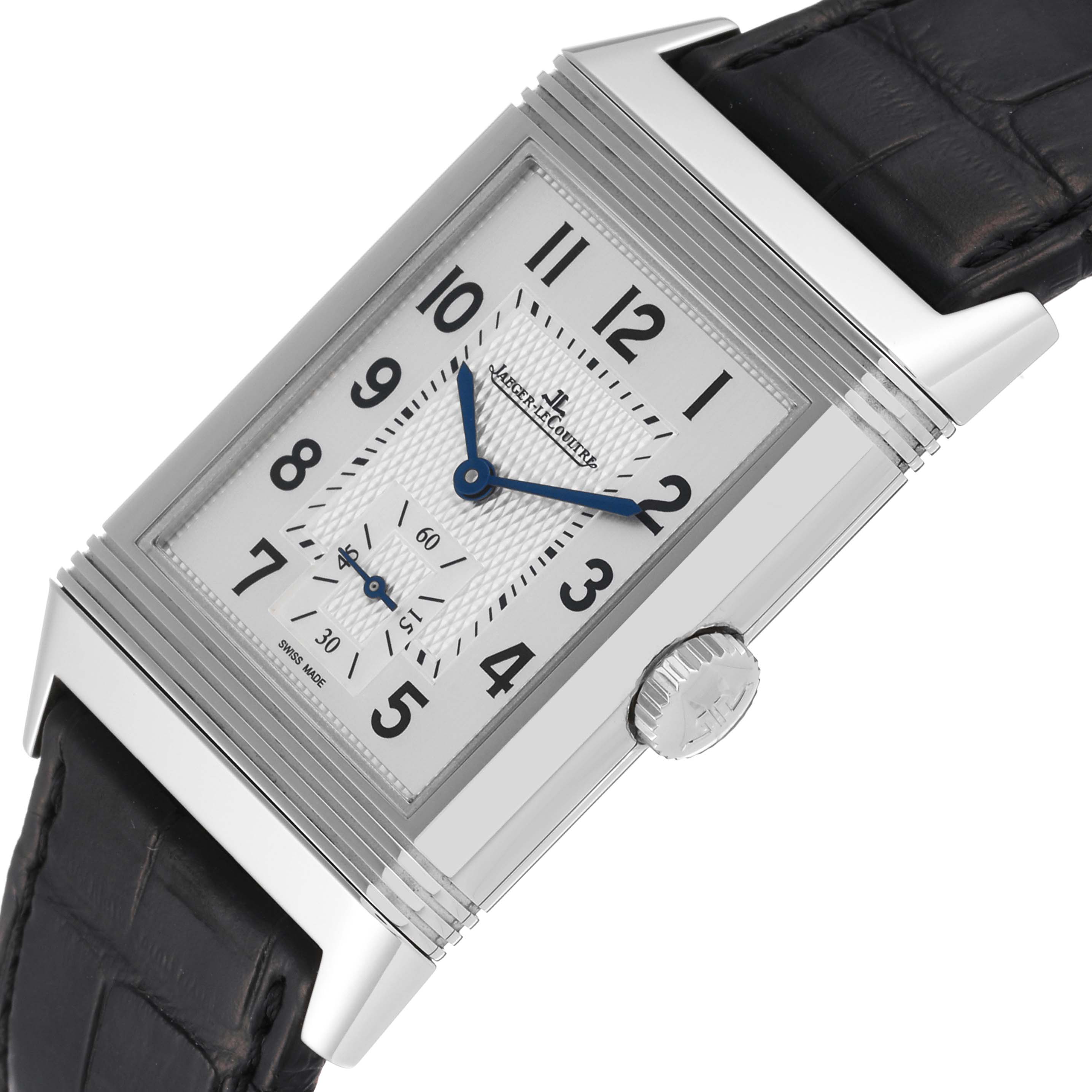 The Jaeger LeCoultre Reverso Q3858520 Men
s Stainless Steel Silver Dial Q3858520 Men
s Stainless Steel Silver Dial watch is shown at an angle, highlighting the face, crown, and part of the leather strap.