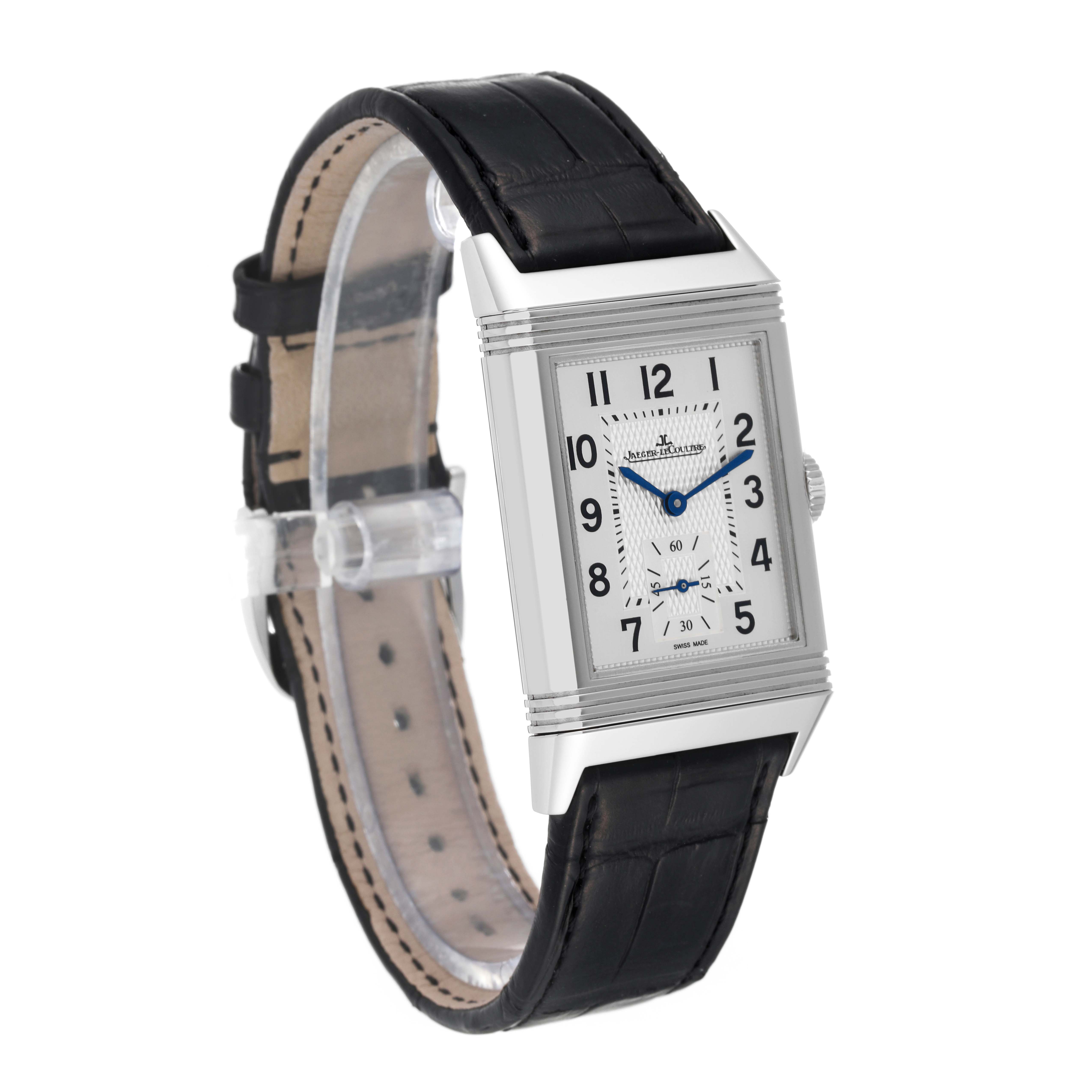 The image shows a Jaeger LeCoultre Reverso Q3858520 Men
s Stainless Steel Silver Dial Q3858520 Men
s Stainless Steel Silver Dial watch at a three-quarter angle, highlighting its face, leather strap, and side crown.