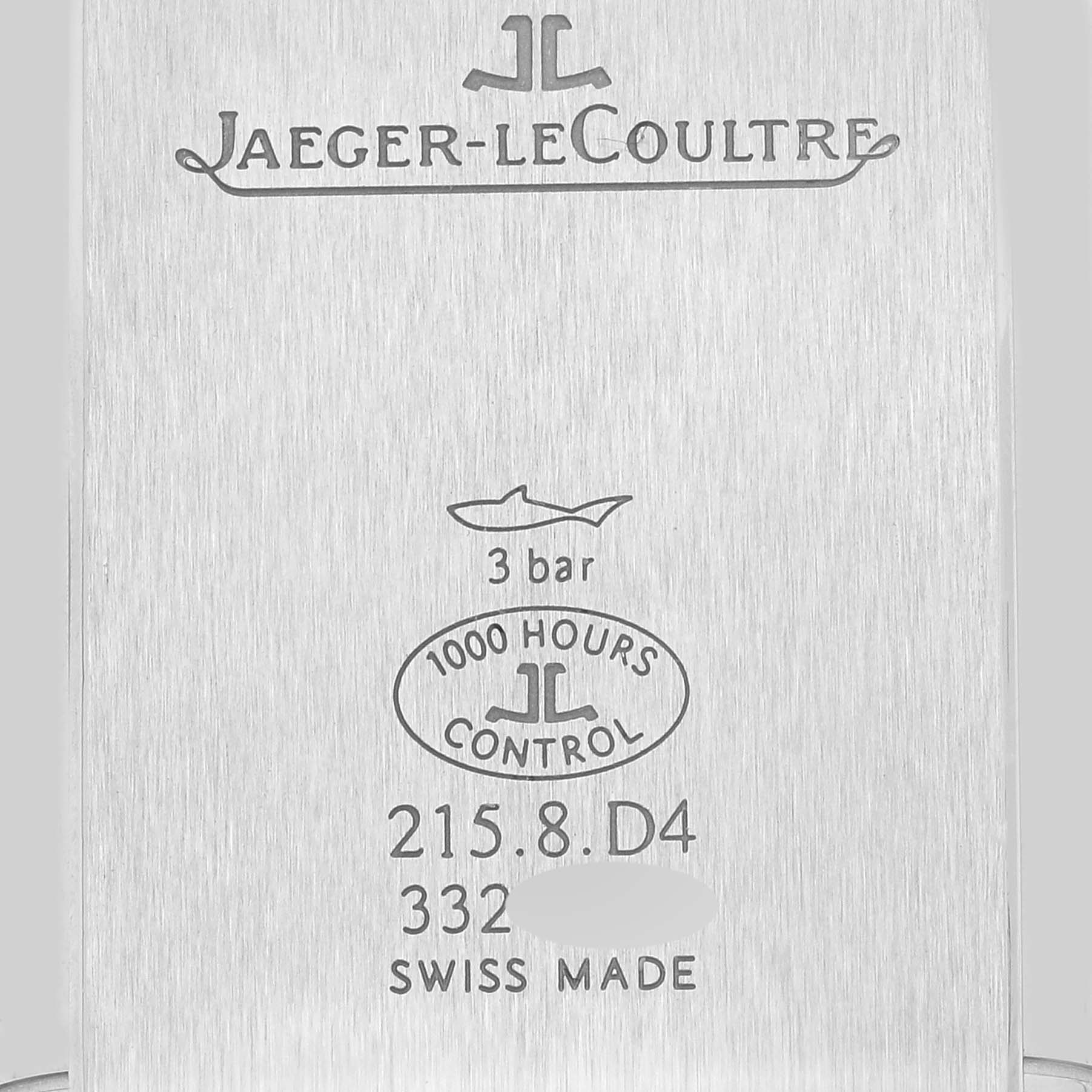 This image shows the back case of a Jaeger-LeCoultre Reverso watch, displaying brand details and specifications.