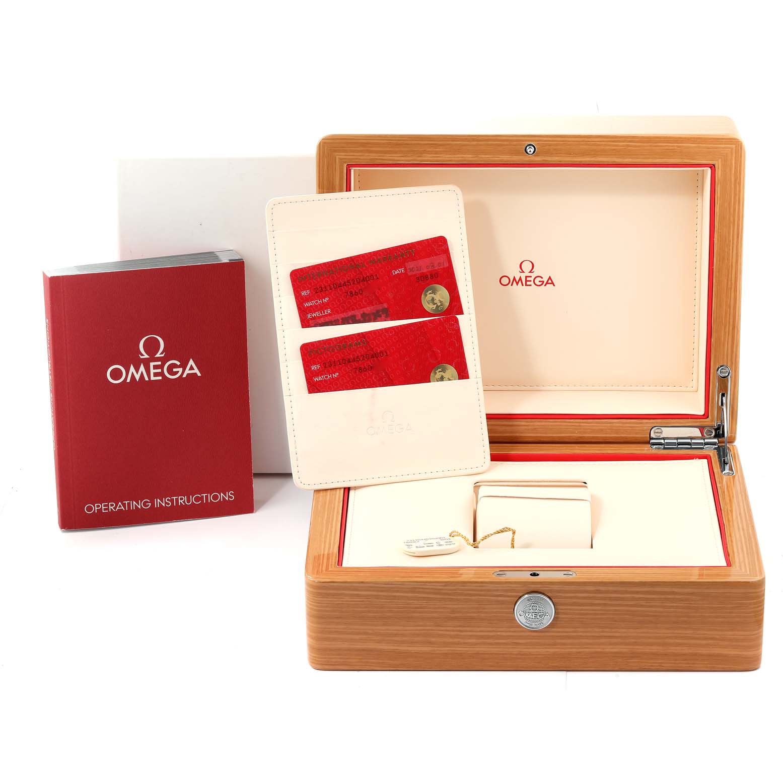 The image shows the Omega Aqua Terra 231.10.44.52.04.001 Men
s Stainless Steel White Dial 231.10.44.52.04.001 Men
s Stainless Steel White Dial watch accessories, including the wooden box, operating instructions, and warranty cards.