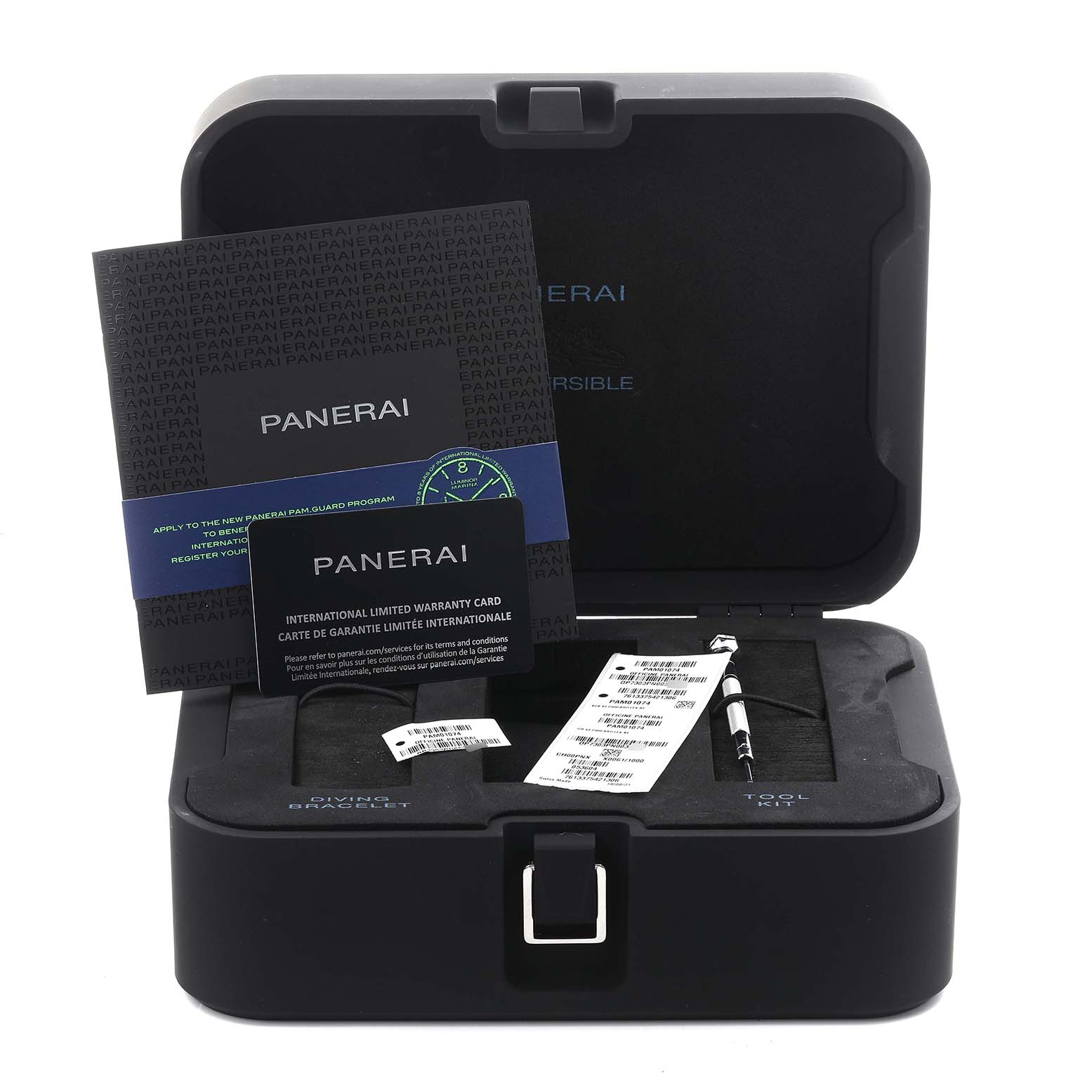 The image shows an open case for the Panerai Submersible PAM01074 Men's Bronze Blue Dial PAM01074 Men's Bronze Blue Dial, displaying manuals, a warranty card, and a tool kit.