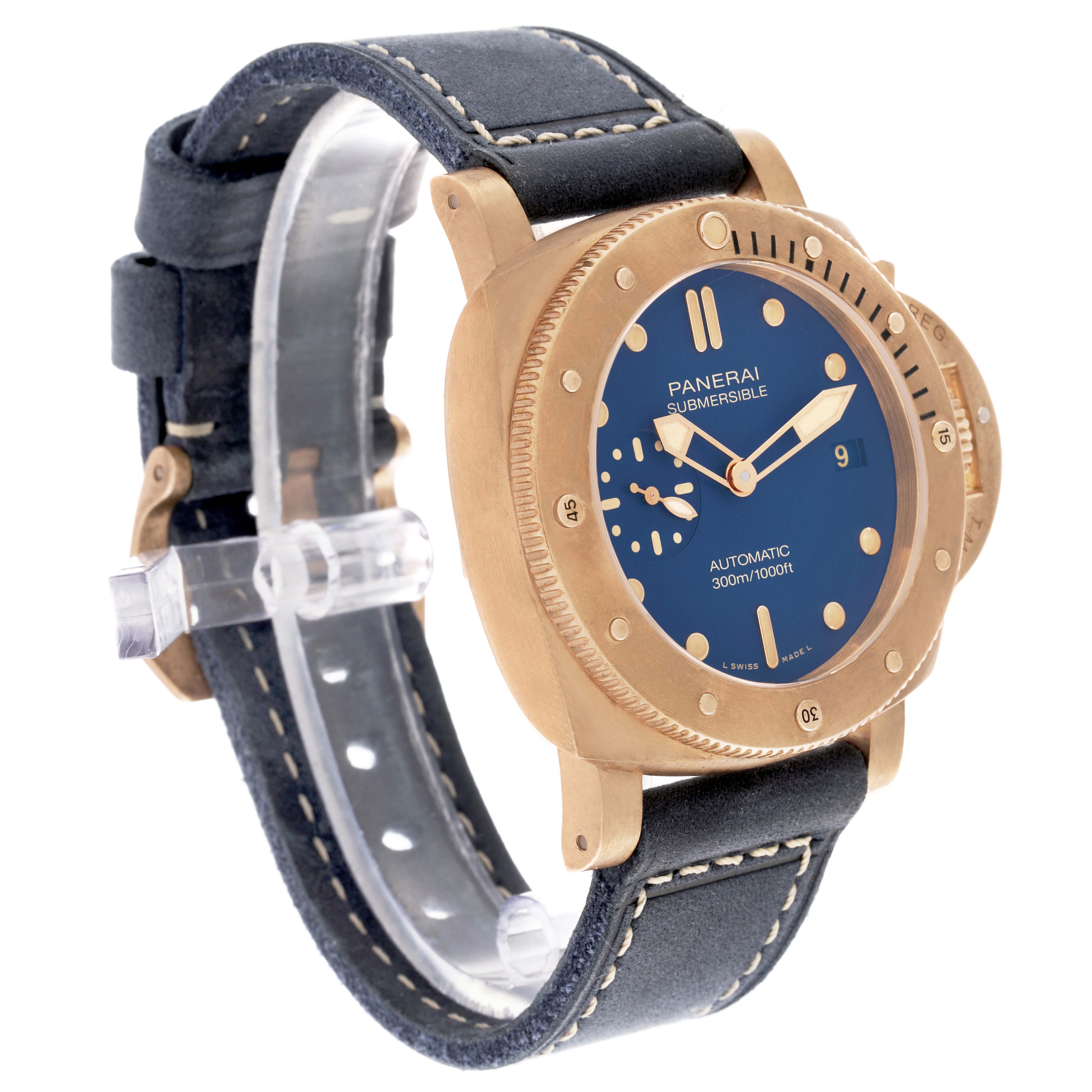 The Panerai Submersible PAM01074 Men's Bronze Blue Dial PAM01074 Men's Bronze Blue Dial watch is shown at an angled side view, highlighting the bezel, dial, and strap.