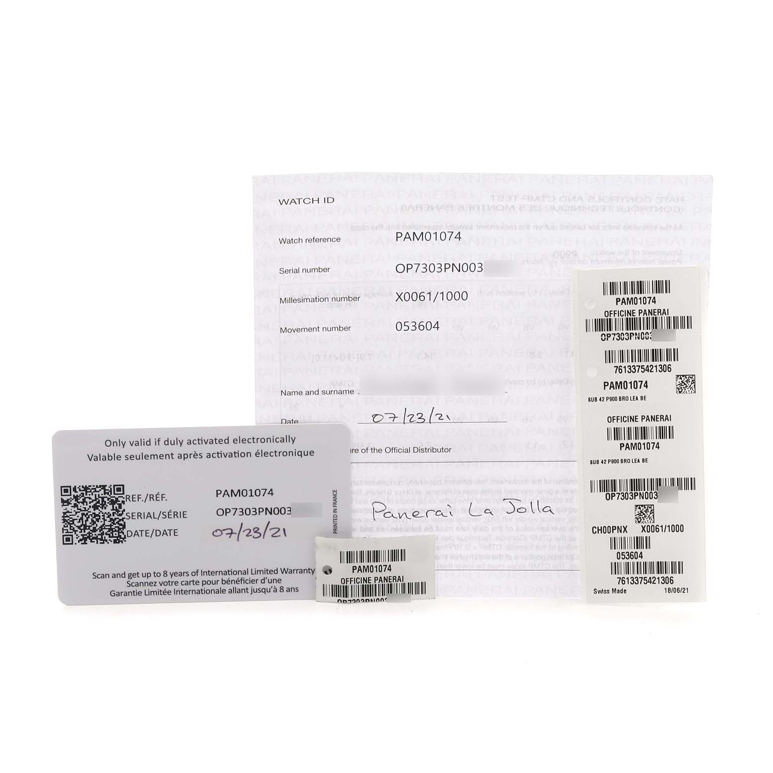 The image shows warranty cards and documentation for a Panerai Submersible PAM01074 Men's Bronze Blue Dial PAM01074 Men's Bronze Blue Dial PAM01074.