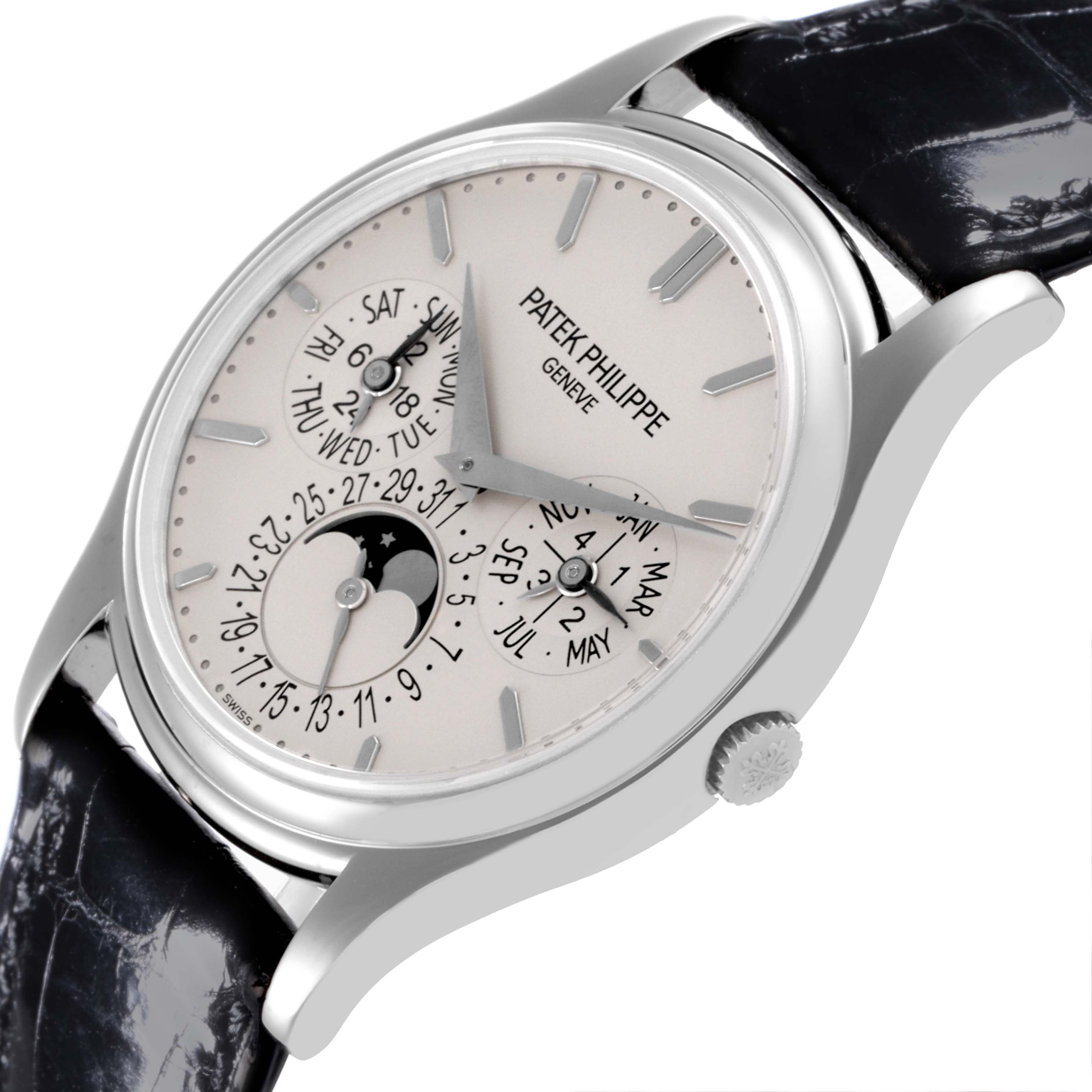 The Patek Philippe Calatrava 5140G-001 Men's White Gold Silver Dial 5140G-001 Men's White Gold Silver Dial watch is shown at a slight angle, displaying the dial, case, crown, and part of the strap.