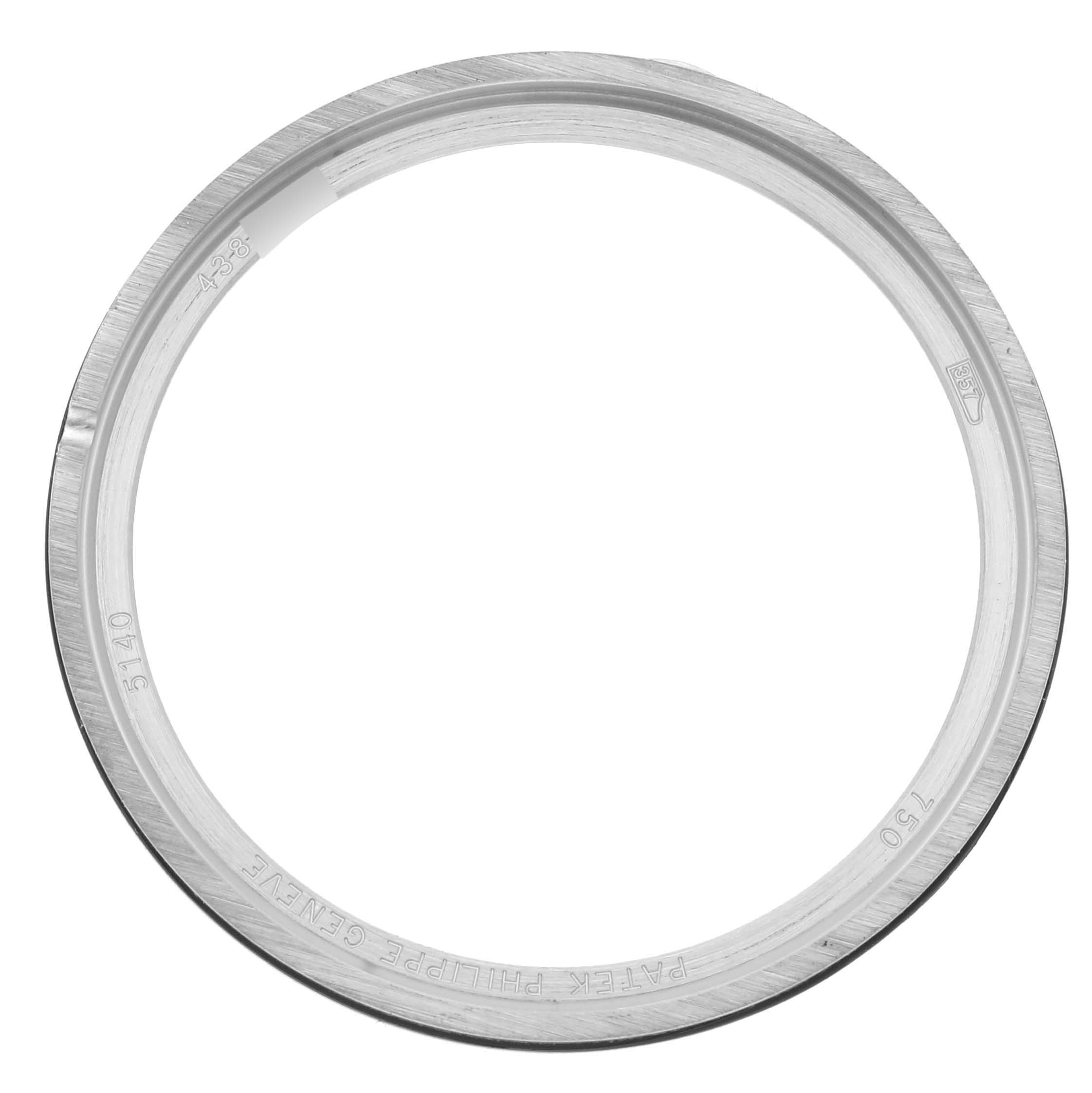 The image shows a bezel for the Patek Philippe Calatrava 5140G-001 Men's White Gold Silver Dial 5140G-001 Men's White Gold Silver Dial watch, viewed from a top angle.