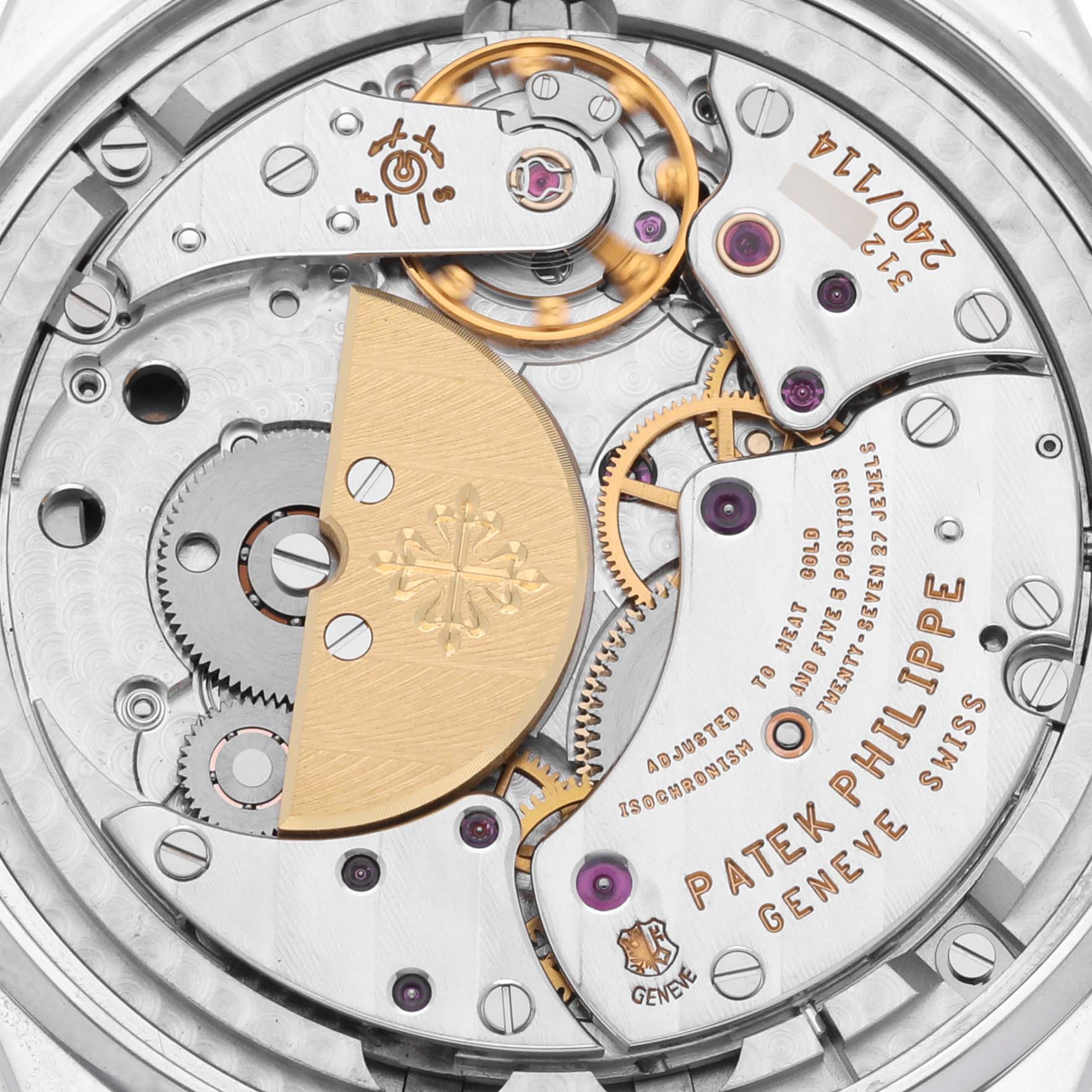 The image shows a close-up view of the Patek Philippe Calatrava 5140G-001 Men's White Gold Silver Dial 5140G-001 Men's White Gold Silver Dial's movement, highlighting its mechanism and engravings.