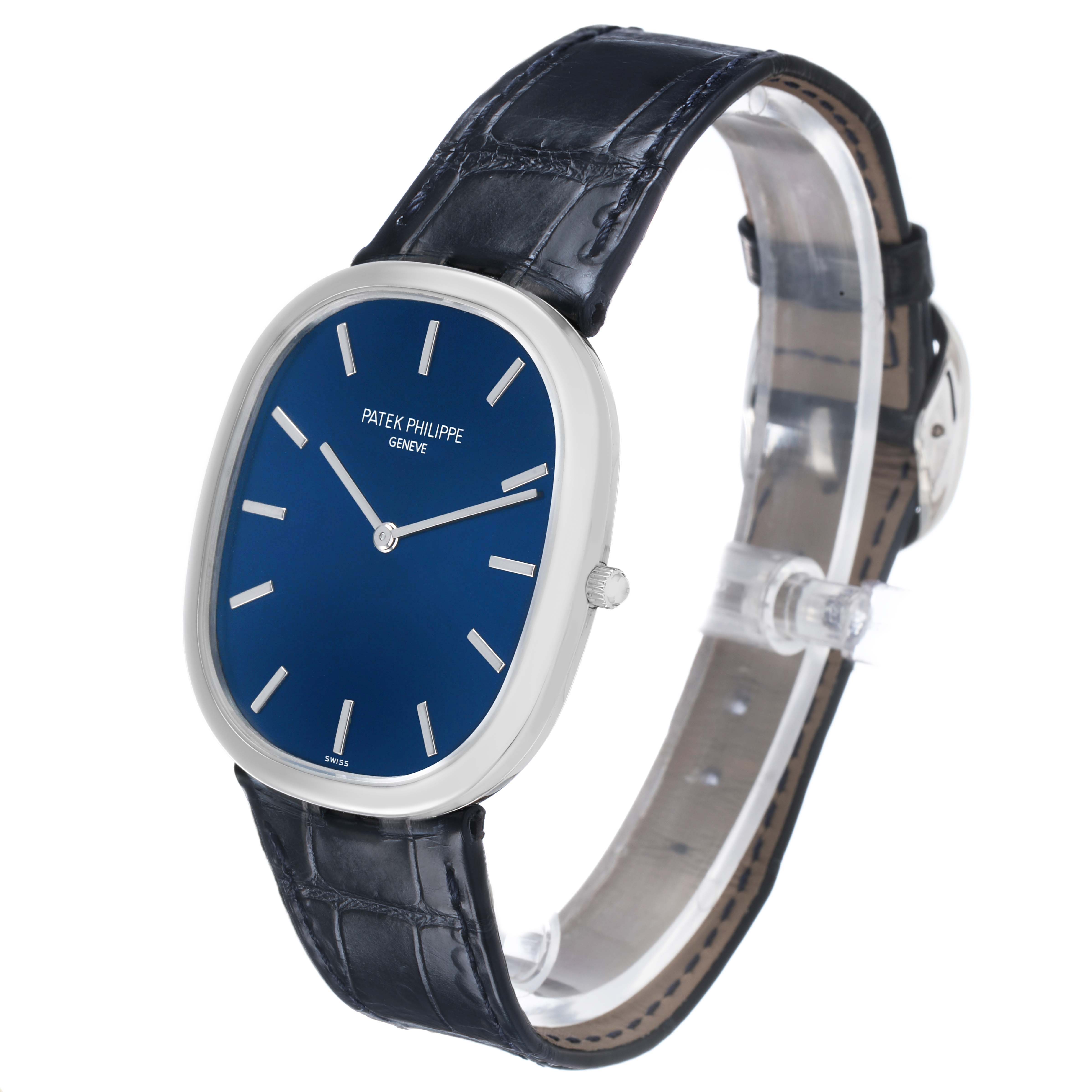 The image shows a side angle of the Patek Philippe Golden Ellipse 5738P-001 Men's Platinum Blue Dial watch, highlighting its blue dial and leather strap.