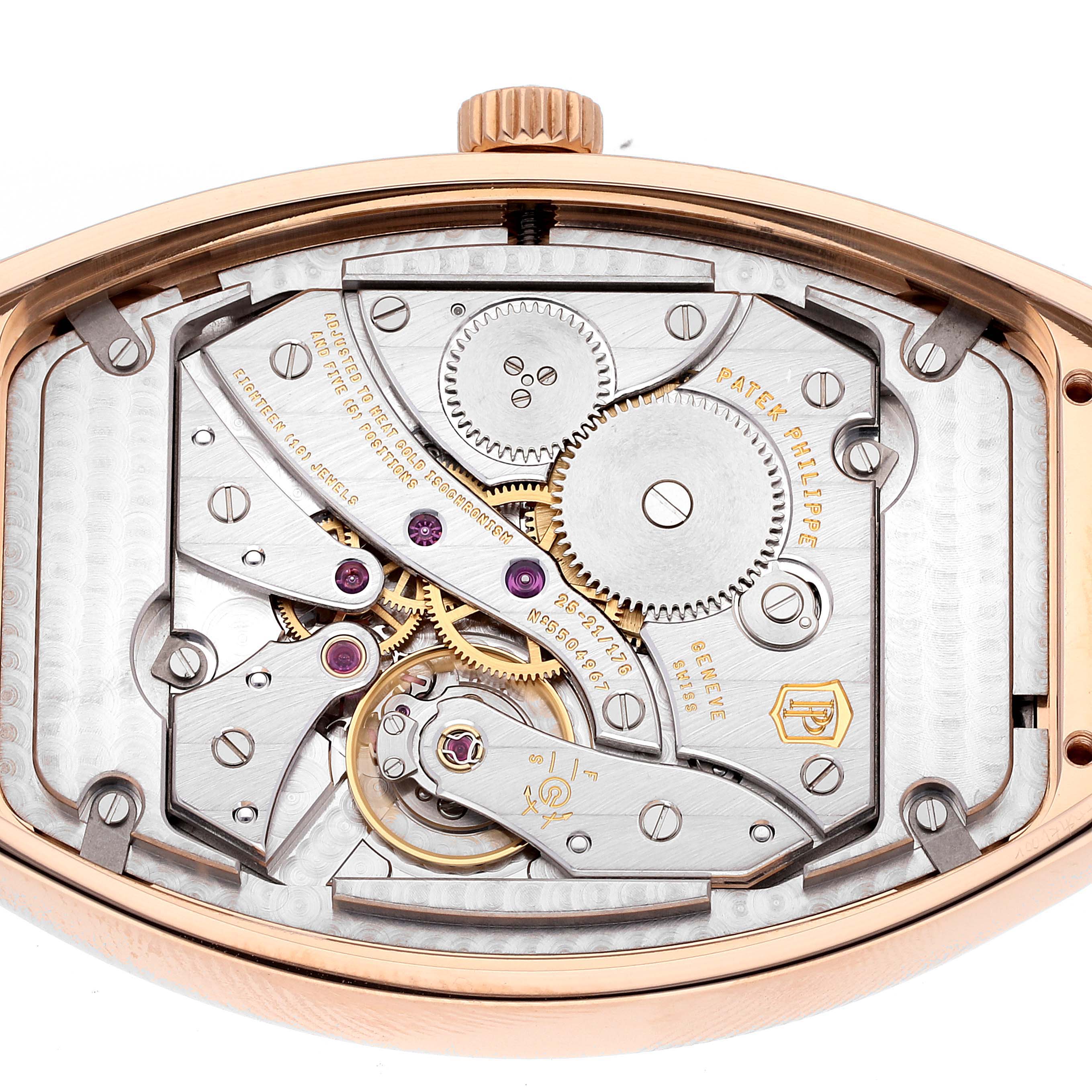 The image shows an angled view of the inner mechanical movement of the Patek Philippe Gondolo 5098R Men
s Rose Gold Silver Dial 5098R Men
s Rose Gold Silver Dial watch.
