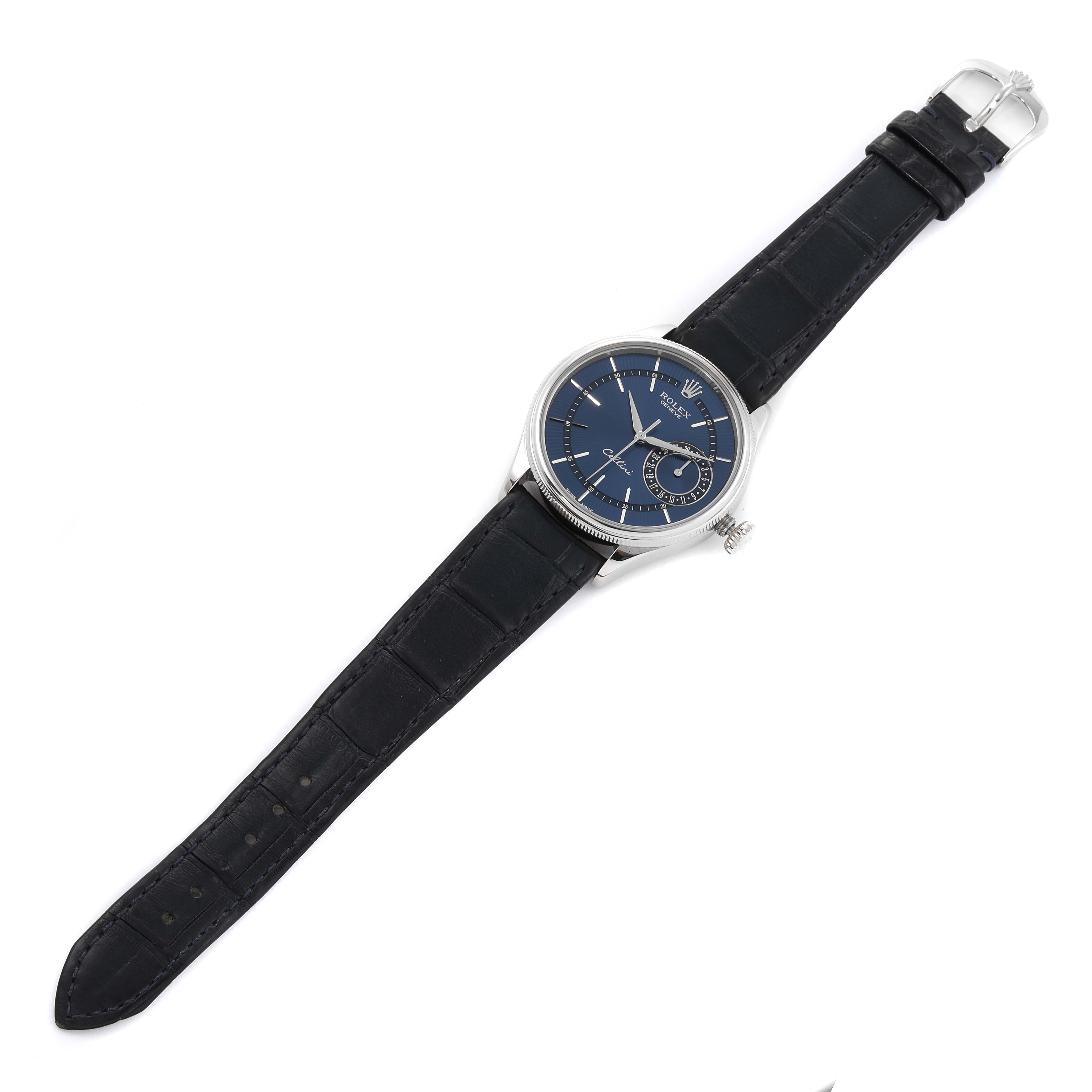 The Rolex Cellini 50519 Men's White Gold Blue Dial 50519 Men's White Gold Blue Dial watch is shown from an overhead angle, displaying its face, strap, and buckle.