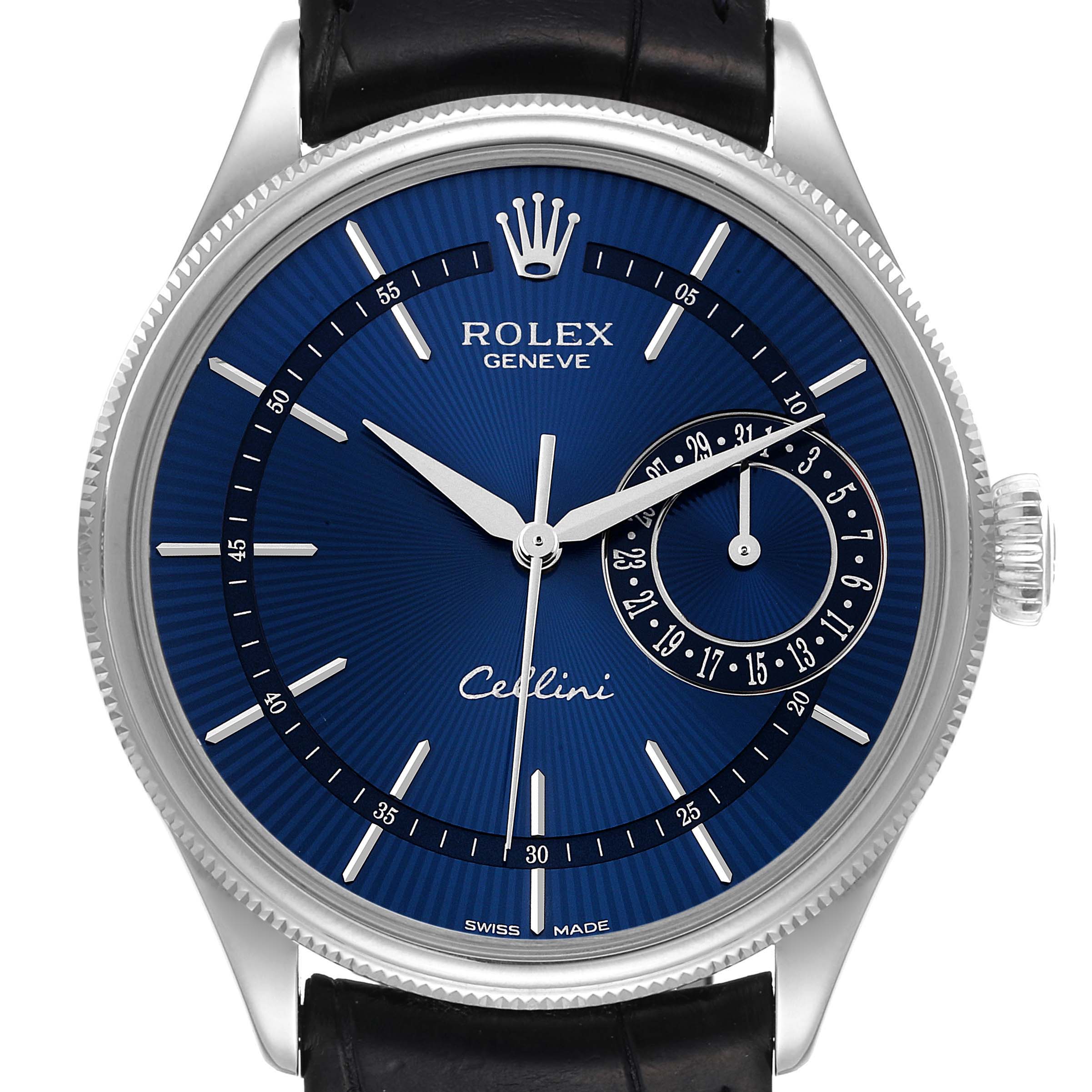 The image shows a frontal view of a Rolex Cellini 50519 Men's White Gold Blue Dial 50519 Men's White Gold Blue Dial watch displaying its blue dial, hands, date subdial, and black strap.