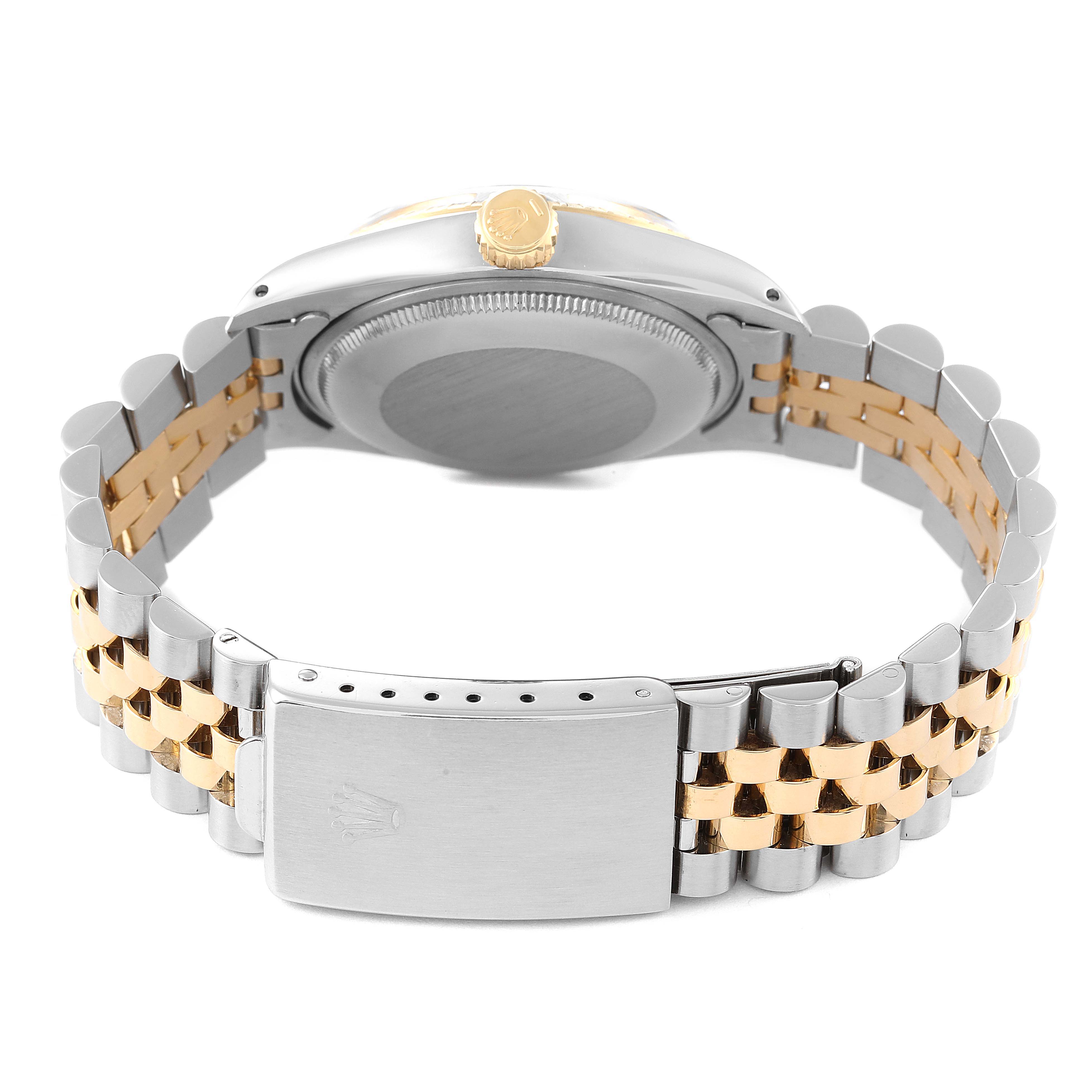 This image shows the back view of a Rolex Vintage Collection 1505 Men's Steel and Gold (two tone) Blue Dial 1505 Men's Steel and Gold (two tone) Blue Dial model, focusing on the clasp and bracelet.