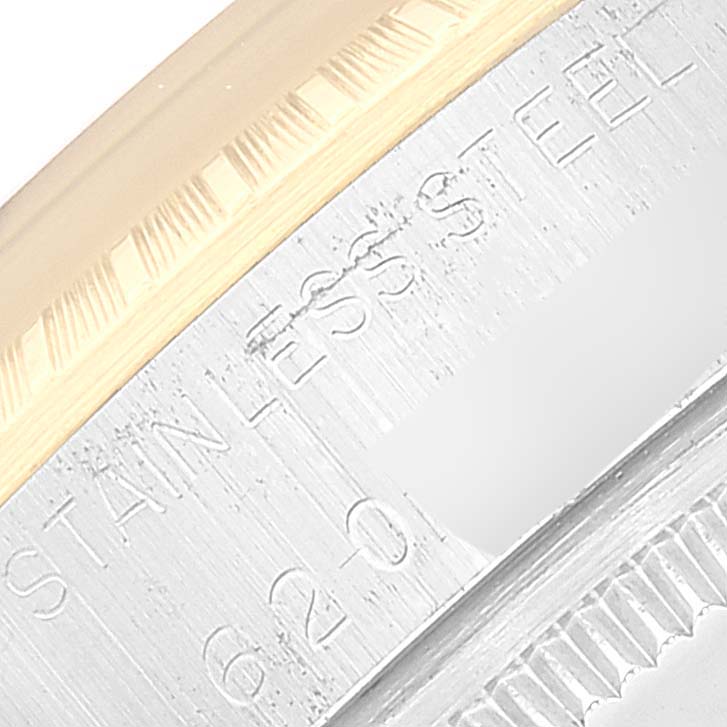 This image shows a close-up of the engraved case back of a Rolex Vintage Collection 1505 Men's Steel and Gold (two tone) Blue Dial 1505 Men's Steel and Gold (two tone) Blue Dial watch.