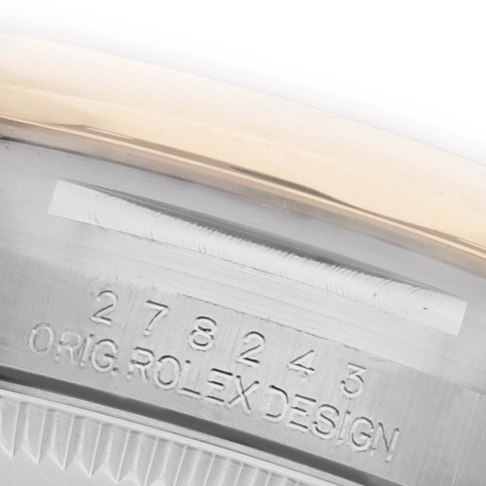 The image shows the side view of a Mid-Size Rolex with its engraved model number on the watch case.