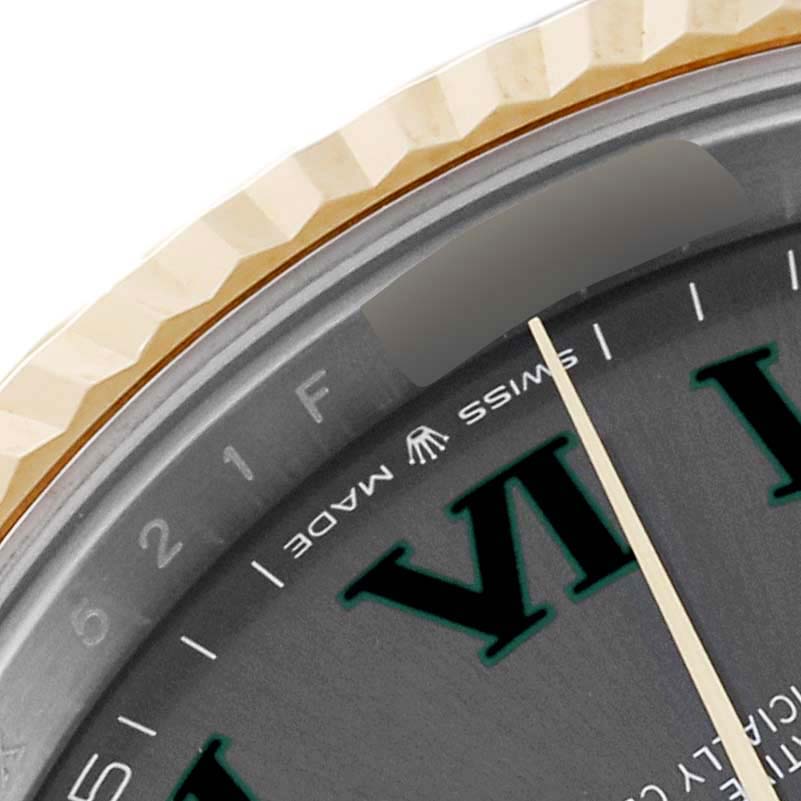 This image shows a close-up of the dial and bezel of a Rolex Datejust 41 126333 Men's Steel and Gold (two tone) Grey Dial 126333 Men's Steel and Gold (two tone) Grey Dial watch, featuring the "SWISS MADE" marking.