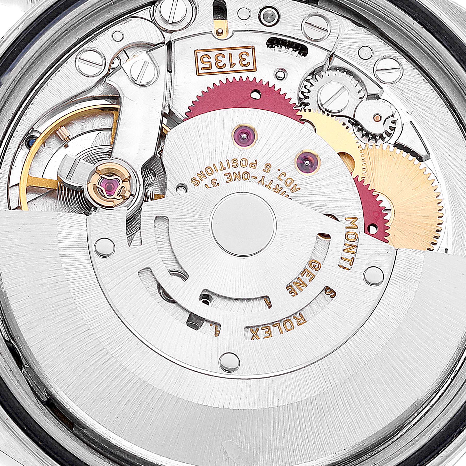 This image shows a close-up of the movement mechanism of a Rolex Datejust 16220 Men's Stainless Steel Blue Dial 16220 Men's Stainless Steel Blue Dial watch, highlighting gears and intricate components.