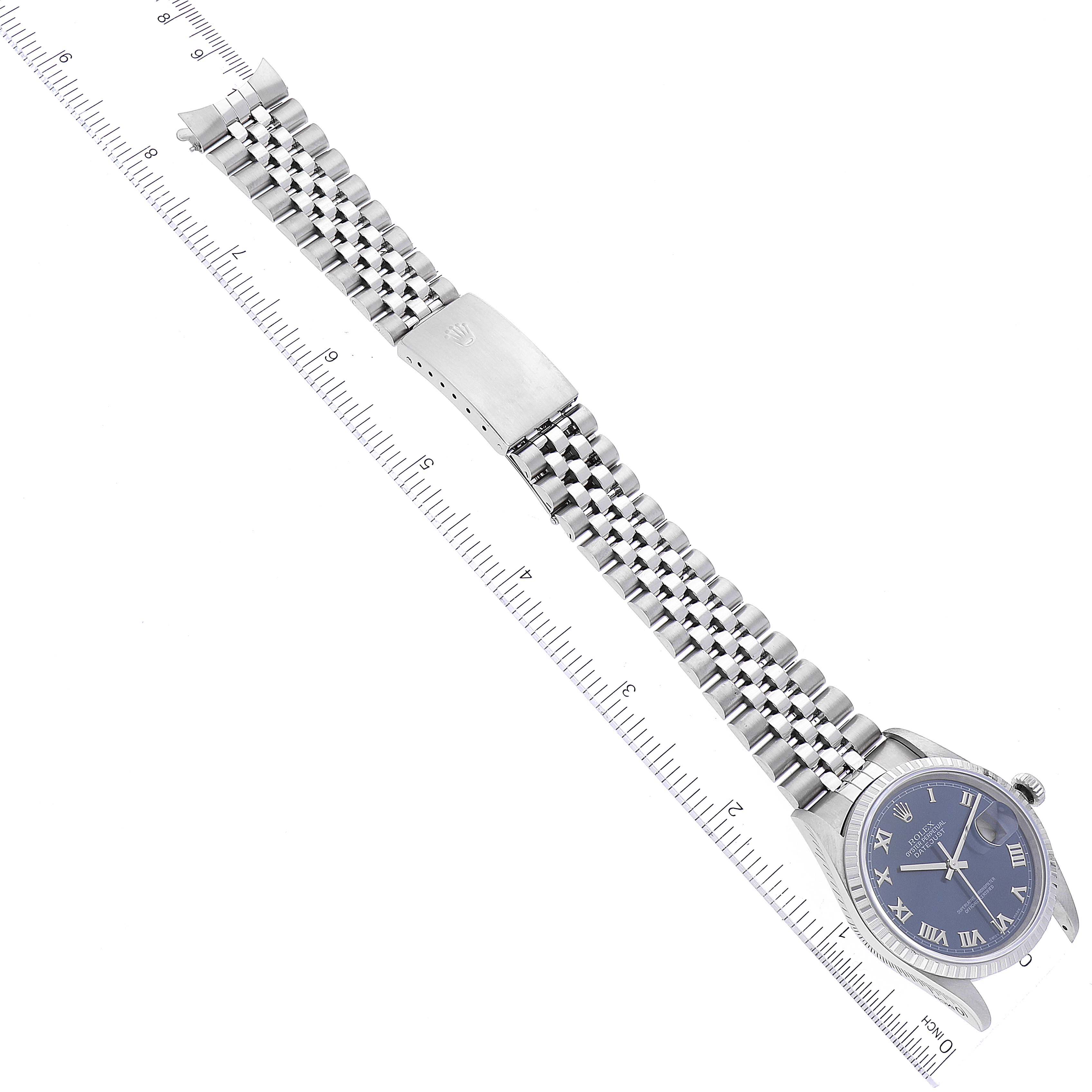 The image shows a Rolex Datejust 16220 Men's Stainless Steel Blue Dial 16220 Men's Stainless Steel Blue Dial watch laid flat with its bracelet extended, allowing a top-down view of the dial, case, and entire bracelet.
