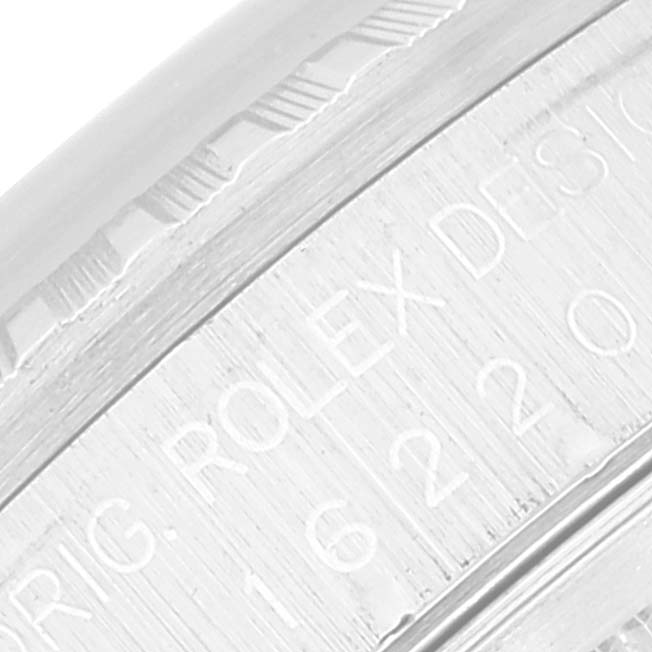 The image shows a close-up of the casing with engraved markings of the Datejust Rolex watch.