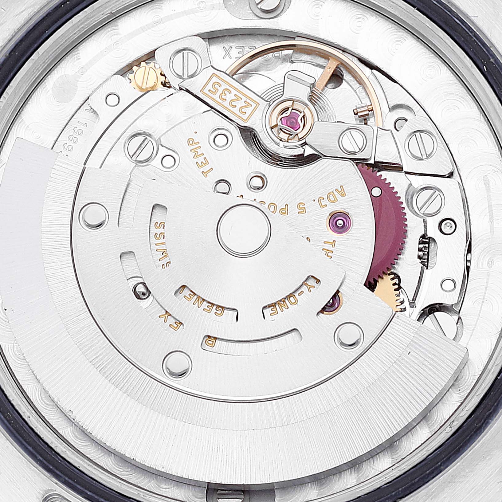 The image shows the detailed inner mechanism of a Rolex Mid-Size 178274 Women's Stainless Steel Blue Dial 178274 Women's Stainless Steel Blue Dial watch, highlighting the movement components and gears.