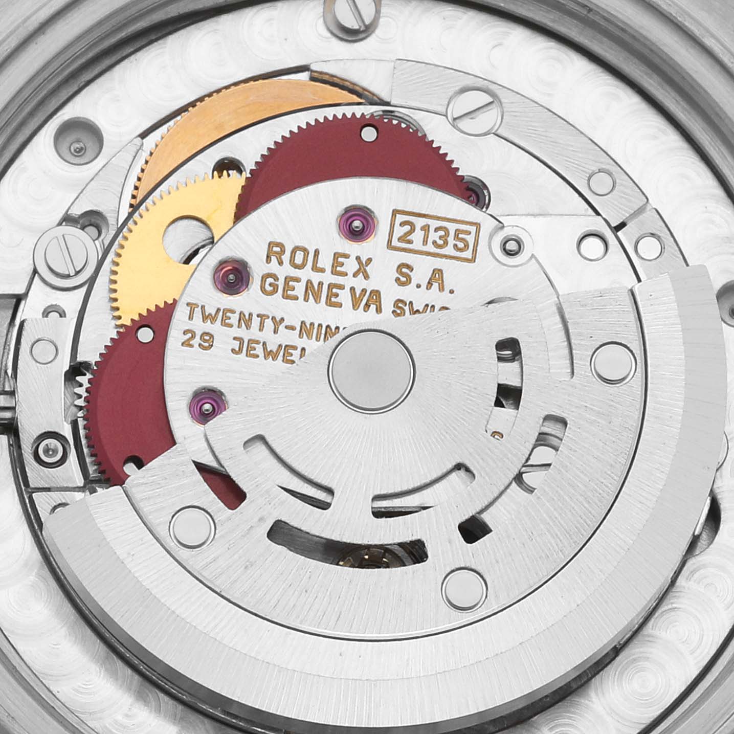 This is a close-up view of the mechanical movement of a Rolex Mid-Size 68273 Women's Steel and Gold (two tone) Champagne Dial 68273 Women's Steel and Gold (two tone) Champagne Dial model watch, showing gears and components.