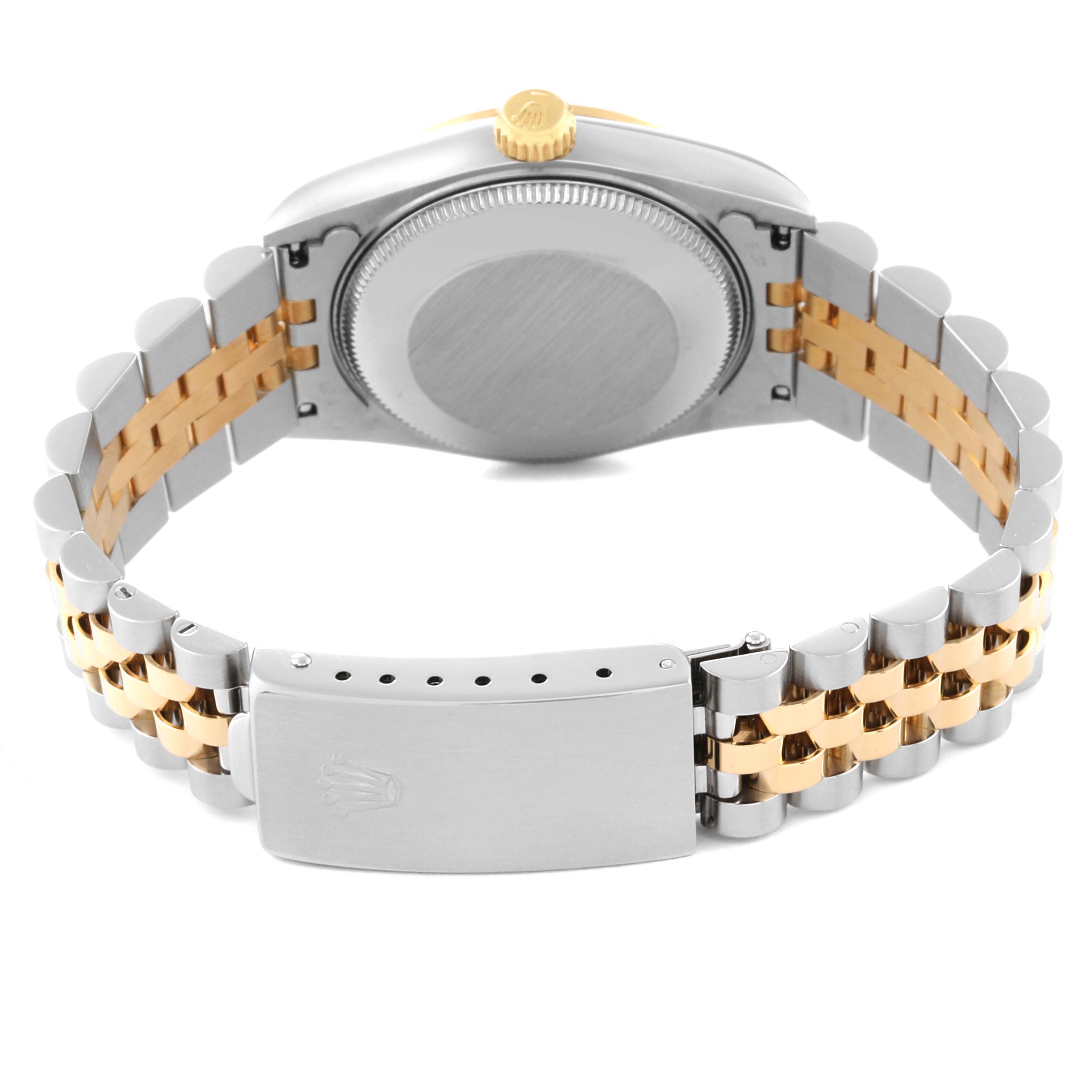 The image shows the back view of a Rolex Mid-Size 68273 Women's Steel and Gold (two tone) Champagne Dial 68273 Women's Steel and Gold (two tone) Champagne Dial watch, highlighting the case back, crown, and two-tone jubilee bracelet with a clasp.