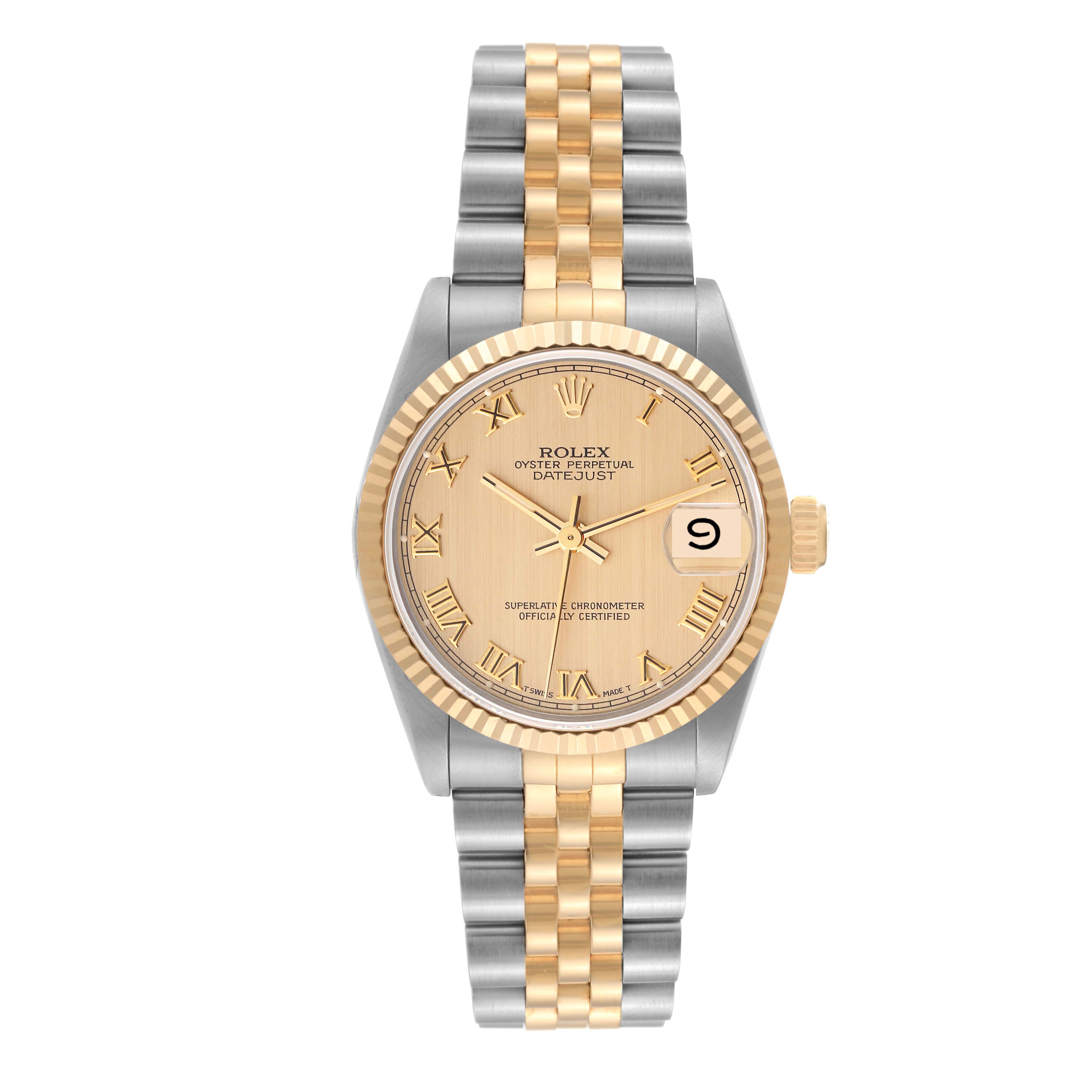 The image shows a frontal view of a Rolex Oyster Perpetual Datejust Mid-Size watch with a two-tone metal bracelet and a date display.