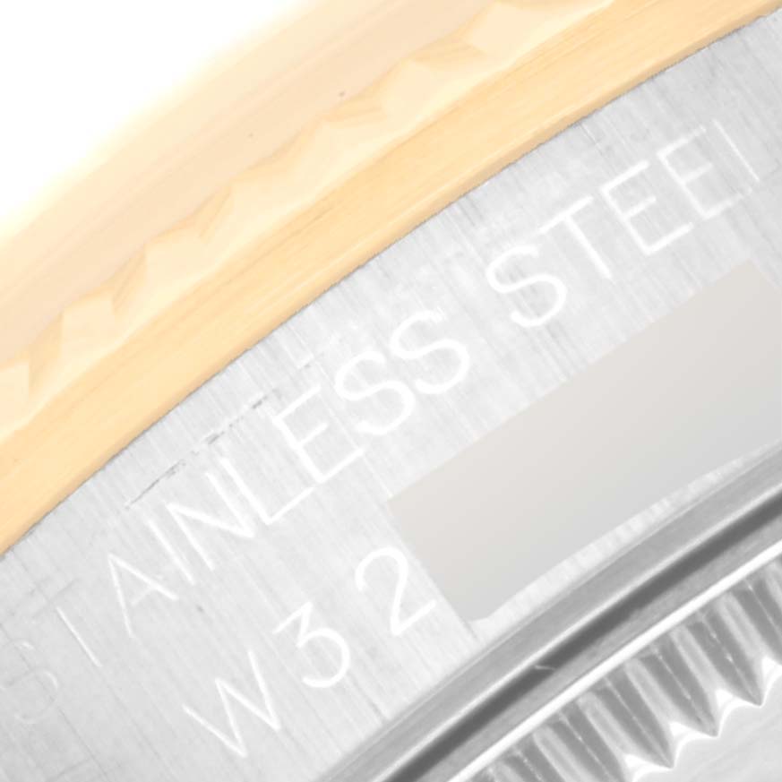 This image shows a close-up of the engraved stainless steel case back of a Rolex Mid-Size 68273 Women's Steel and Gold (two tone) Champagne Dial 68273 Women's Steel and Gold (two tone) Champagne Dial watch.