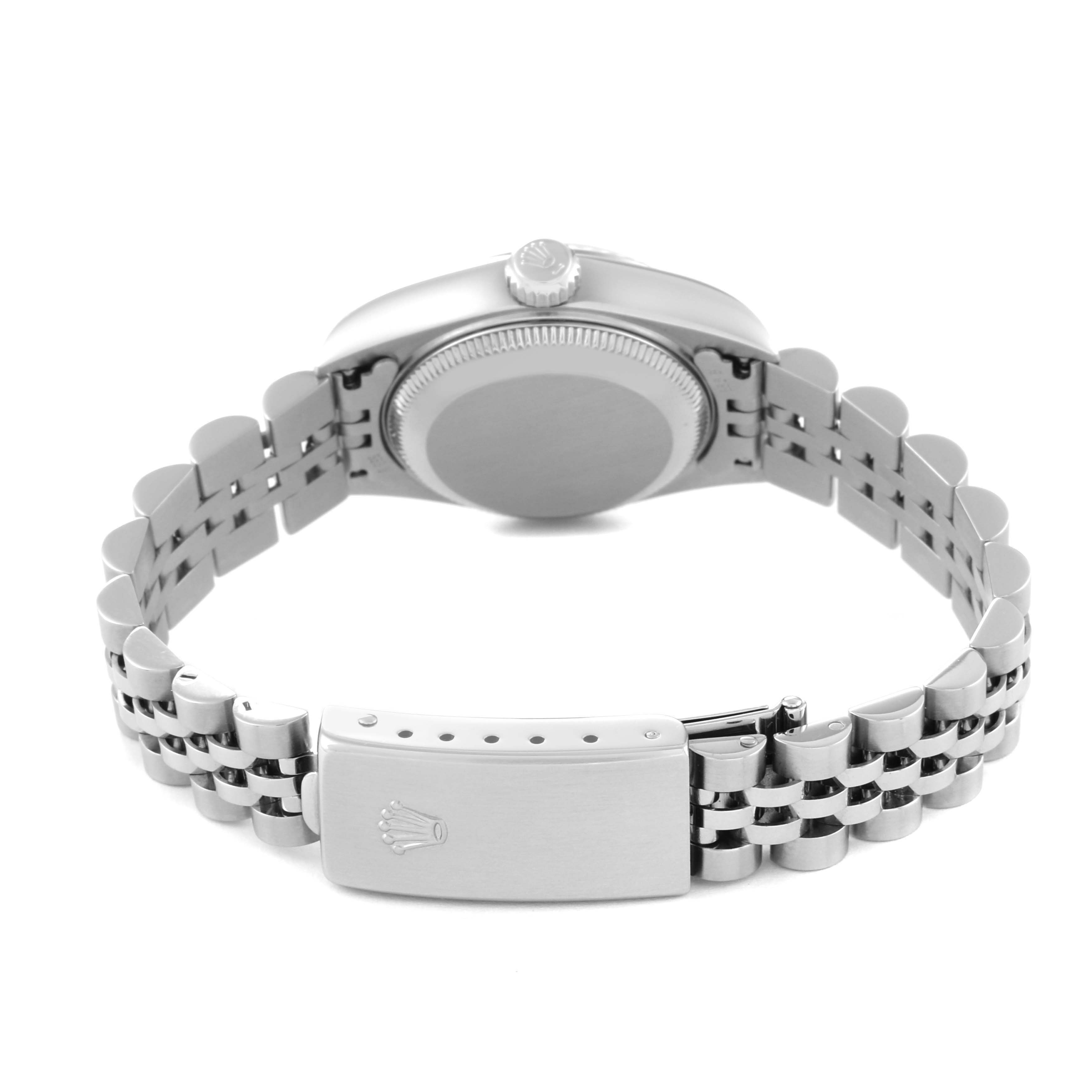 The image shows the back view of a Rolex Datejust 79174 Women's Stainless Steel Silver Dial 79174 Women's Stainless Steel Silver Dial watch, highlighting the caseback, crown, and bracelet clasp.