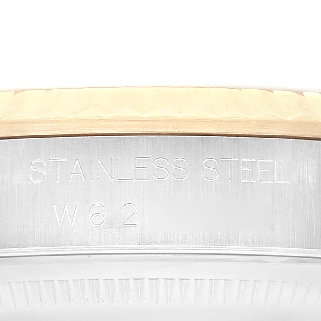 This is a close-up angle showing the "STAINLESS STEEL" engraving on a Rolex Datejust 16233 Men's Steel and Gold (two tone) Blue Dial 16233 Men's Steel and Gold (two tone) Blue Dial watch band.