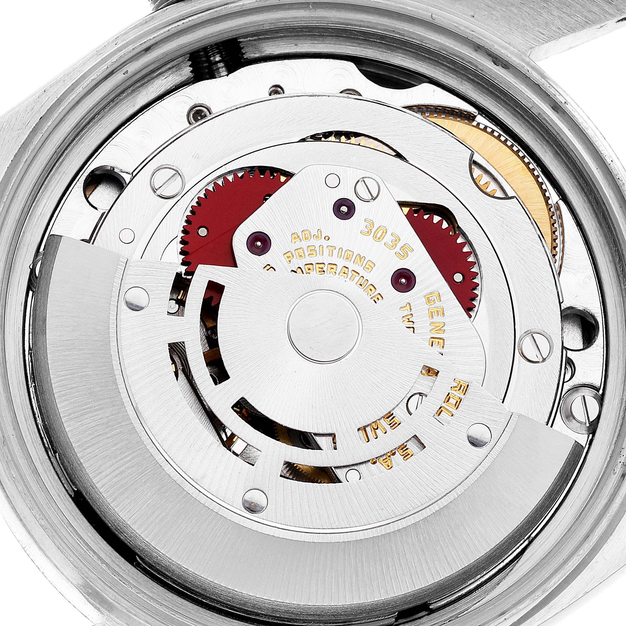 This image shows the internal components of a Rolex Datejust 16014 Men's Stainless Steel Silver Dial 16014 Men's Stainless Steel Silver Dial model, viewed from the back, focusing on the movement and gears.