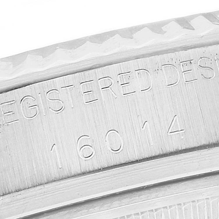 This image shows a close-up of the model number "16014" on the case of a Rolex Datejust 16014 Men's Stainless Steel Silver Dial 16014 Men's Stainless Steel Silver Dial watch.