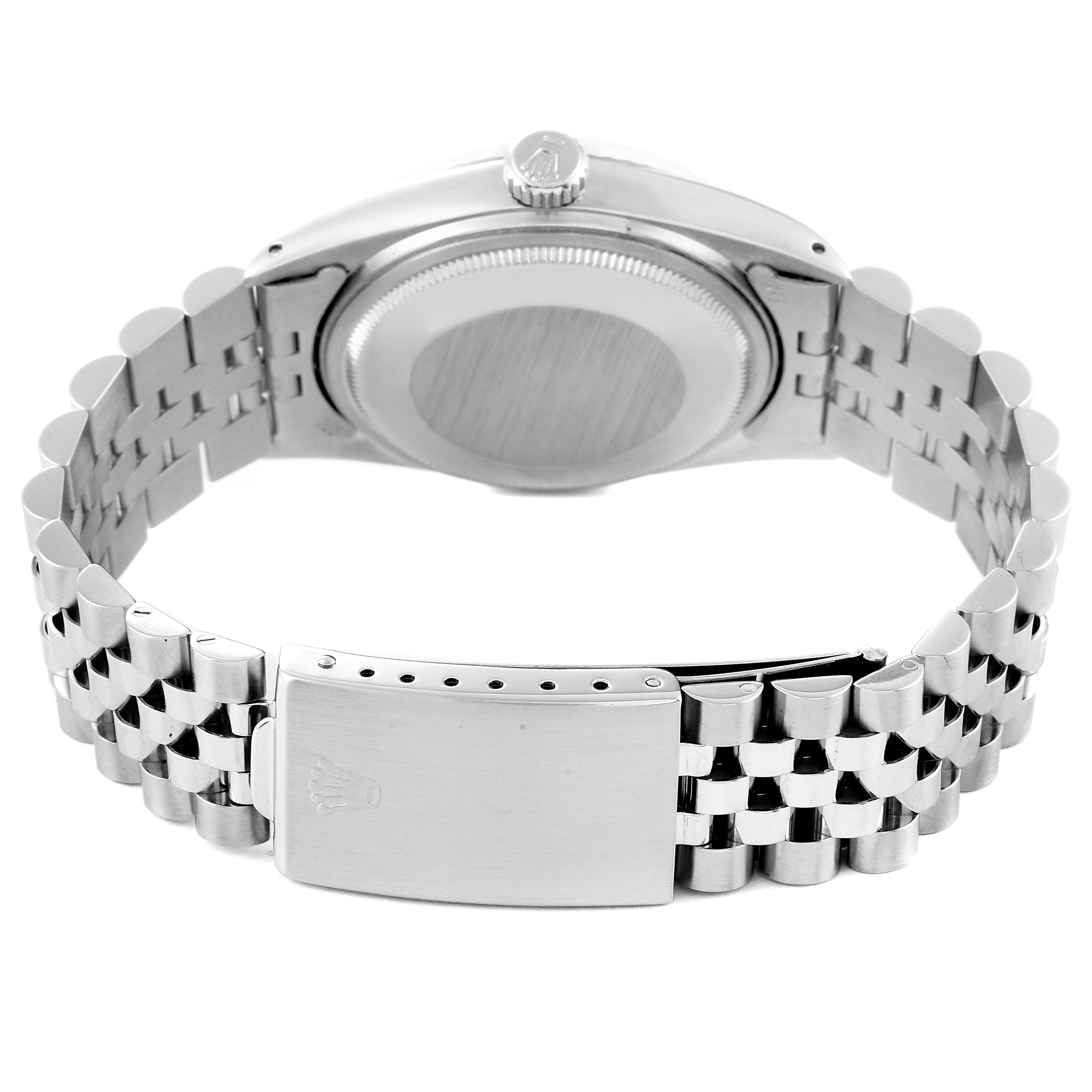 The image shows the back view of a Rolex Datejust 16014 Men's Stainless Steel Silver Dial 16014 Men's Stainless Steel Silver Dial watch, highlighting the case back, crown, and bracelet clasp.
