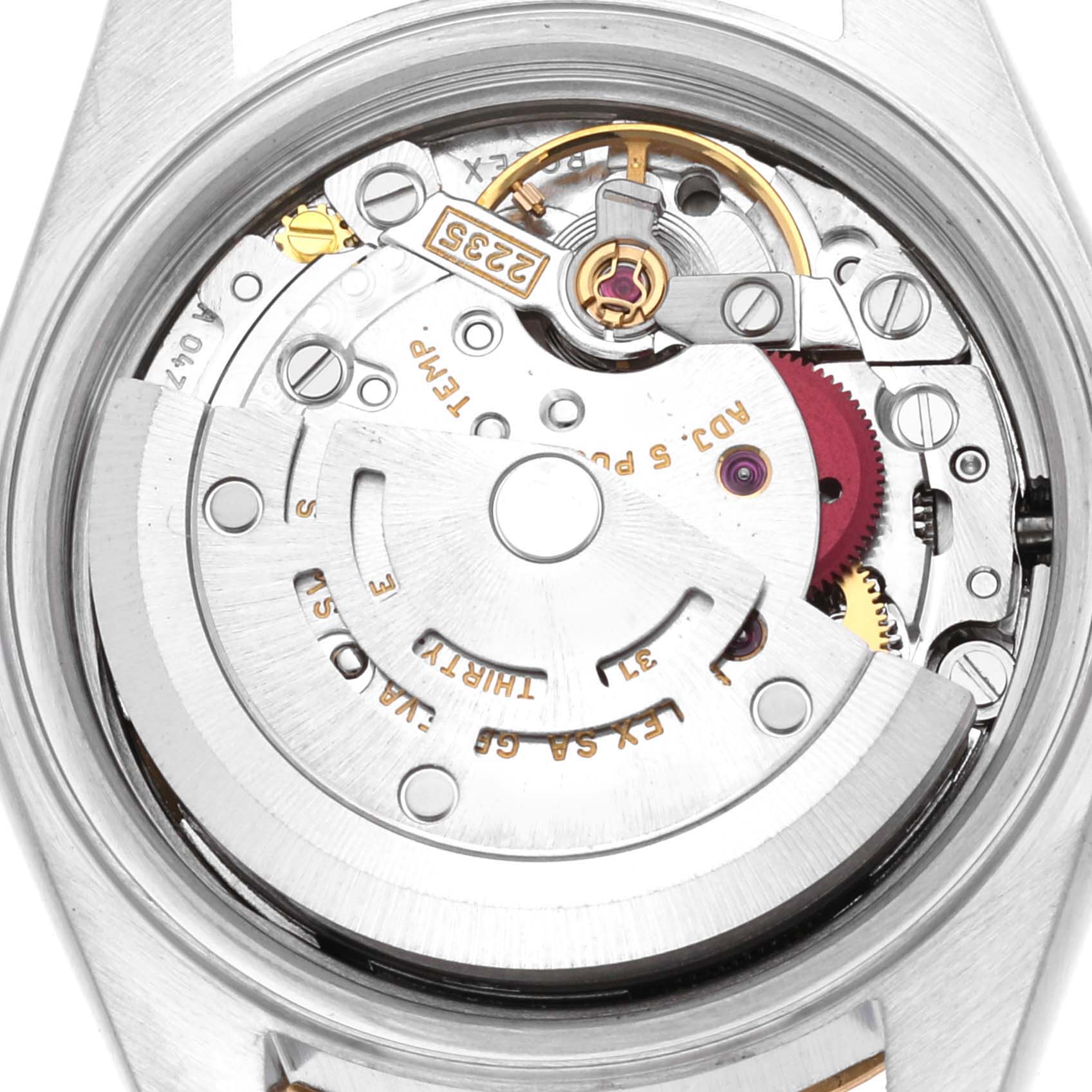 This is an image of the underside, showing the inner machine components of a Rolex Datejust 79173G Women's Steel and Gold (two tone) Champagne Dial 79173G Women's Steel and Gold (two tone) Champagne Dial watch.