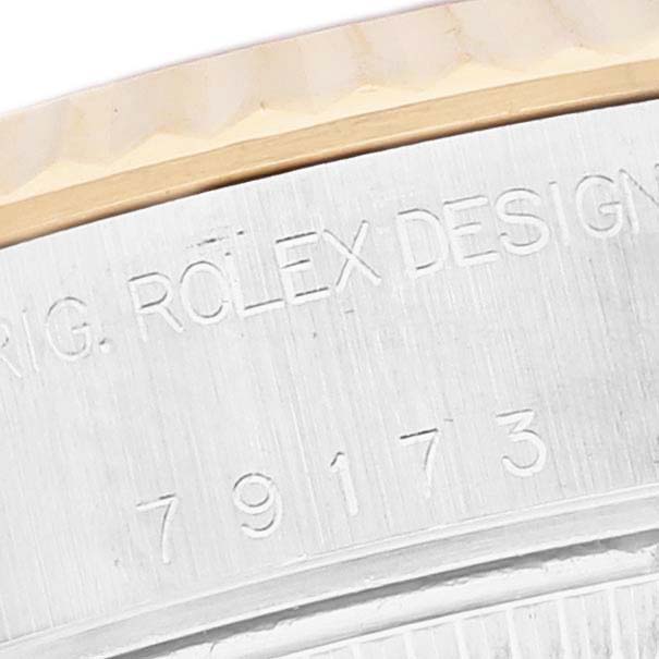 The image shows a close-up of the case side of a Rolex Datejust 79173 Women's Steel and Gold (two tone) White Dial 79173 Women's Steel and Gold (two tone) White Dial, highlighting the model number engraving.