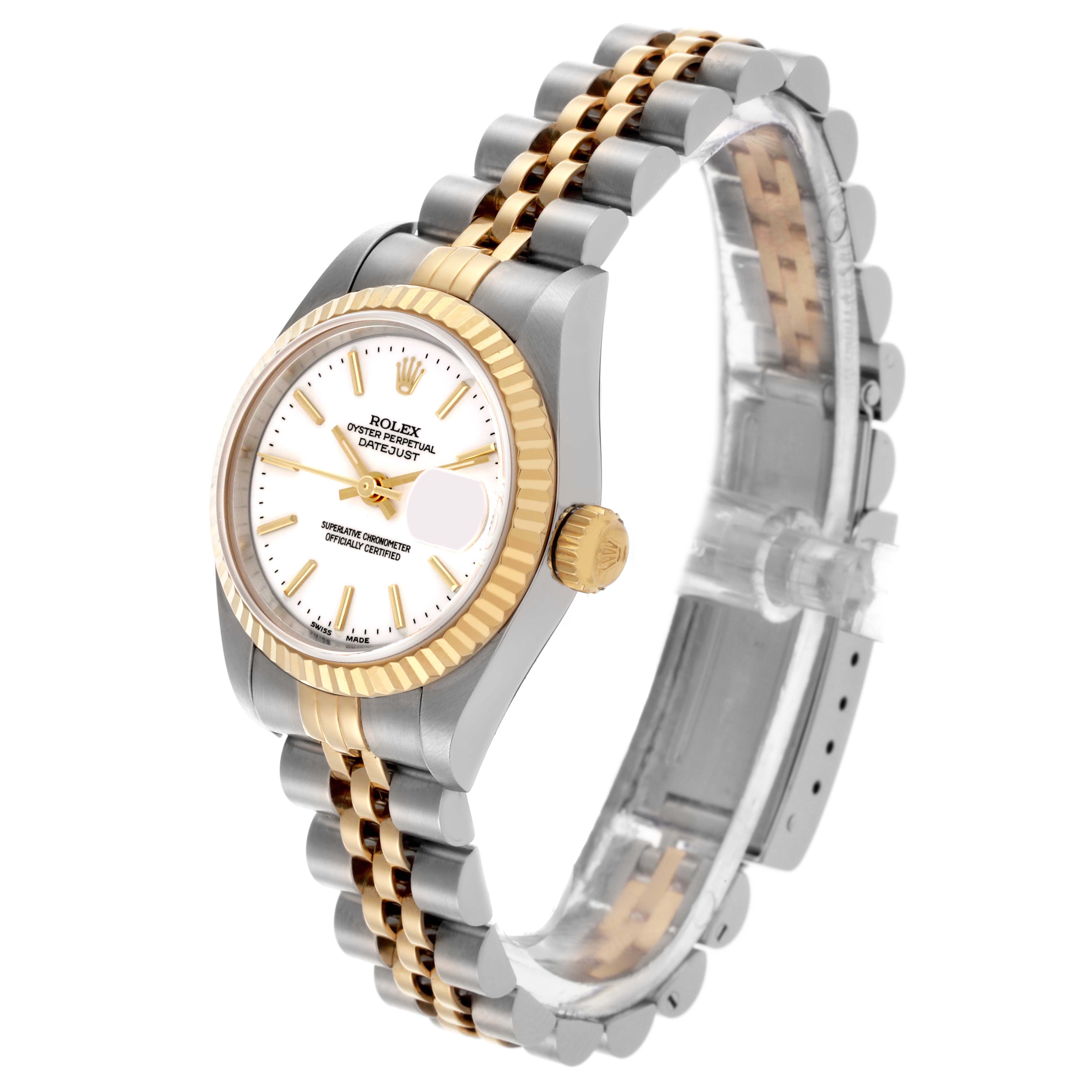 The Rolex Datejust 79173 Women's Steel and Gold (two tone) White Dial 79173 Women's Steel and Gold (two tone) White Dial is shown at an angled view, highlighting the two-tone bracelet, fluted bezel, and white dial with gold hour markers.