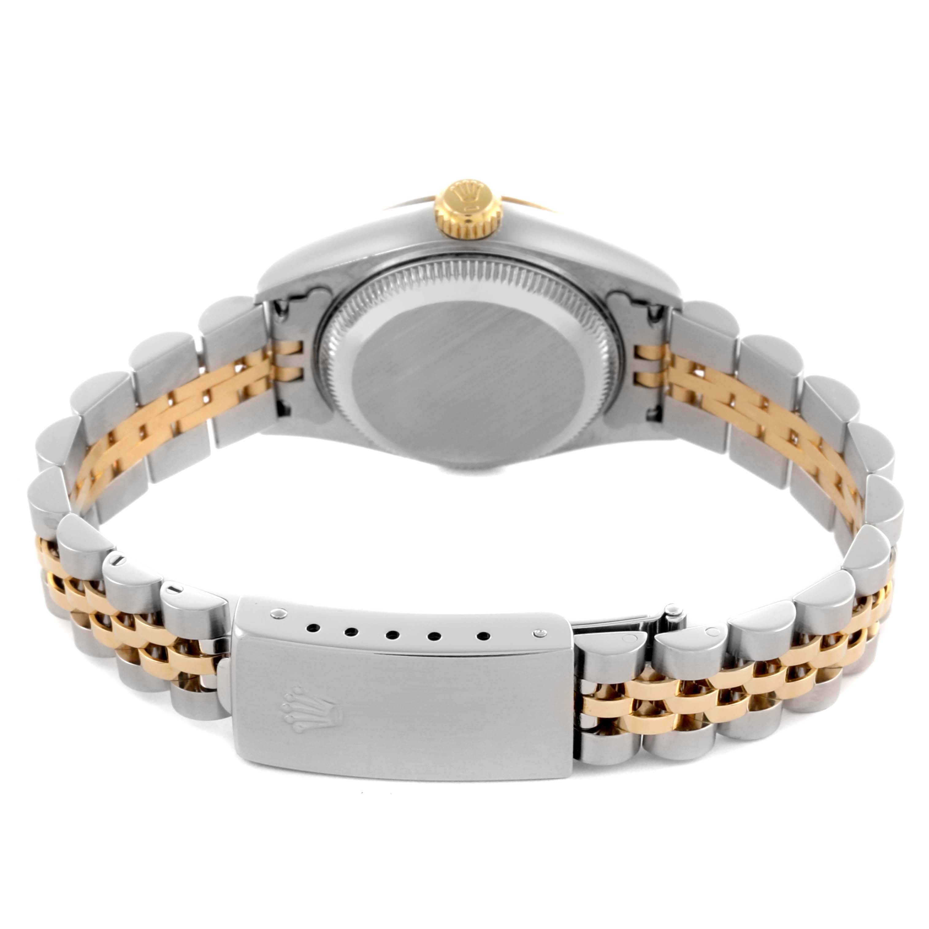 The image shows the back and clasp of a Rolex Datejust 79173 Women's Steel and Gold (two tone) White Dial 79173 Women's Steel and Gold (two tone) White Dial watch, highlighting its two-tone bracelet.