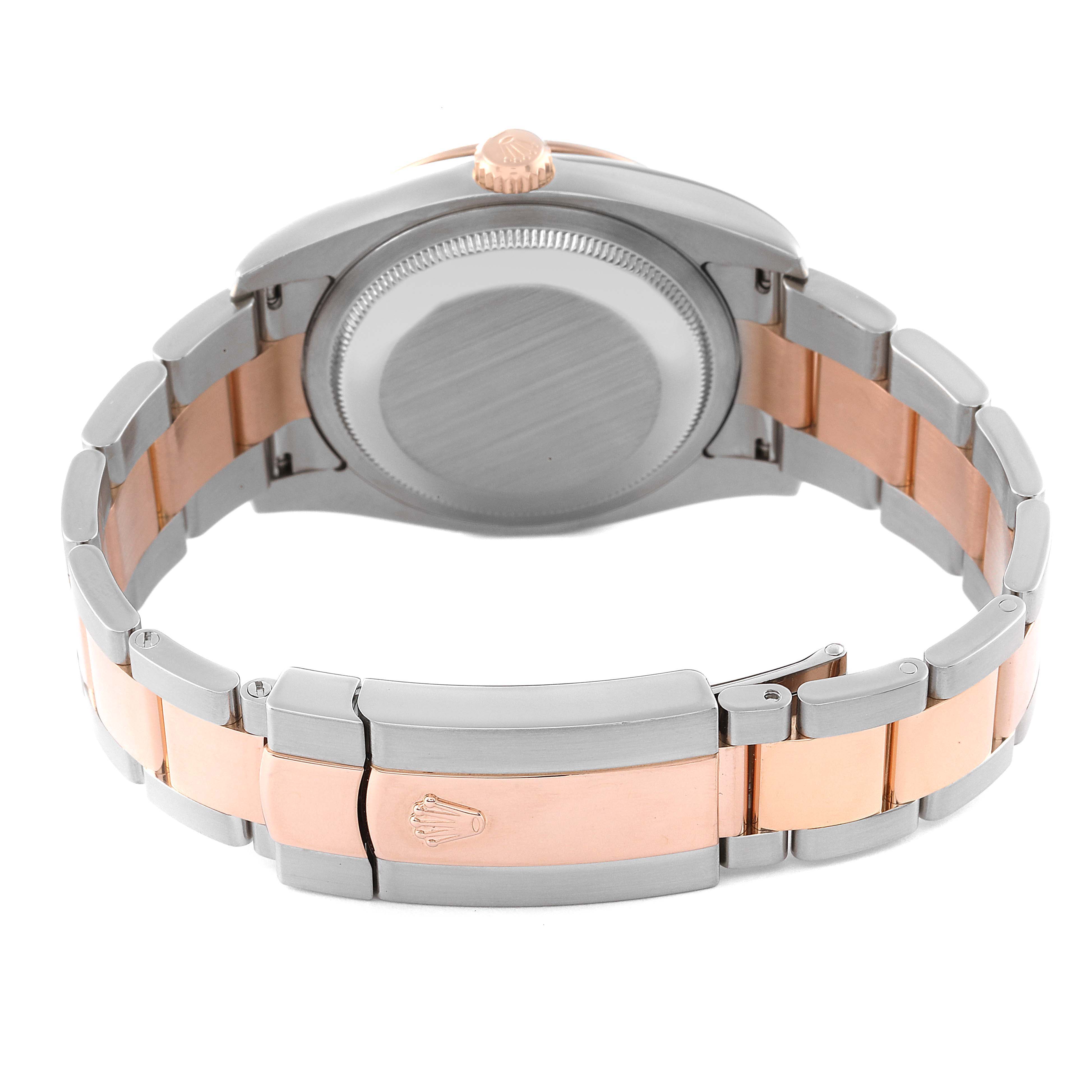 The image shows the back view of a Rolex Turn-o-Graph 116261 Men's Steel and Gold (two tone) Black Dial 116261 Men's Steel and Gold (two tone) Black Dial watch, focusing on its clasp, bracelet, and case back.