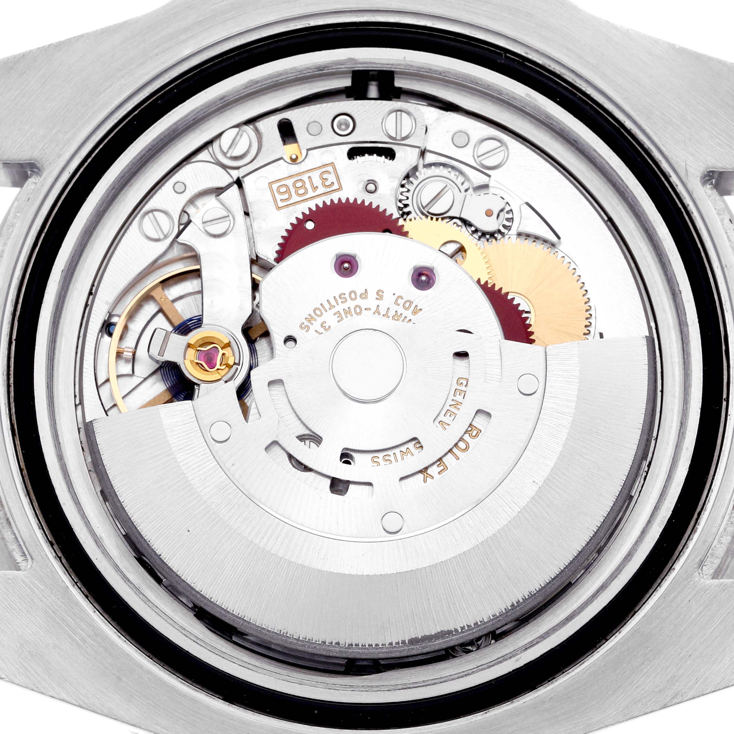 The image shows the internal movement of a Rolex GMT-Master 116710LN Men's Stainless Steel Black Dial 116710LN Men's Stainless Steel Black Dial watch from a top-down angle.