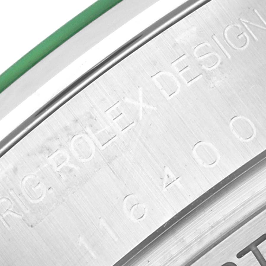 The image shows a close-up of the engraved side edge of a Rolex Milgauss 116400GV Men's Stainless Steel Black Dial 116400GV Men's Stainless Steel Black Dial watch case.