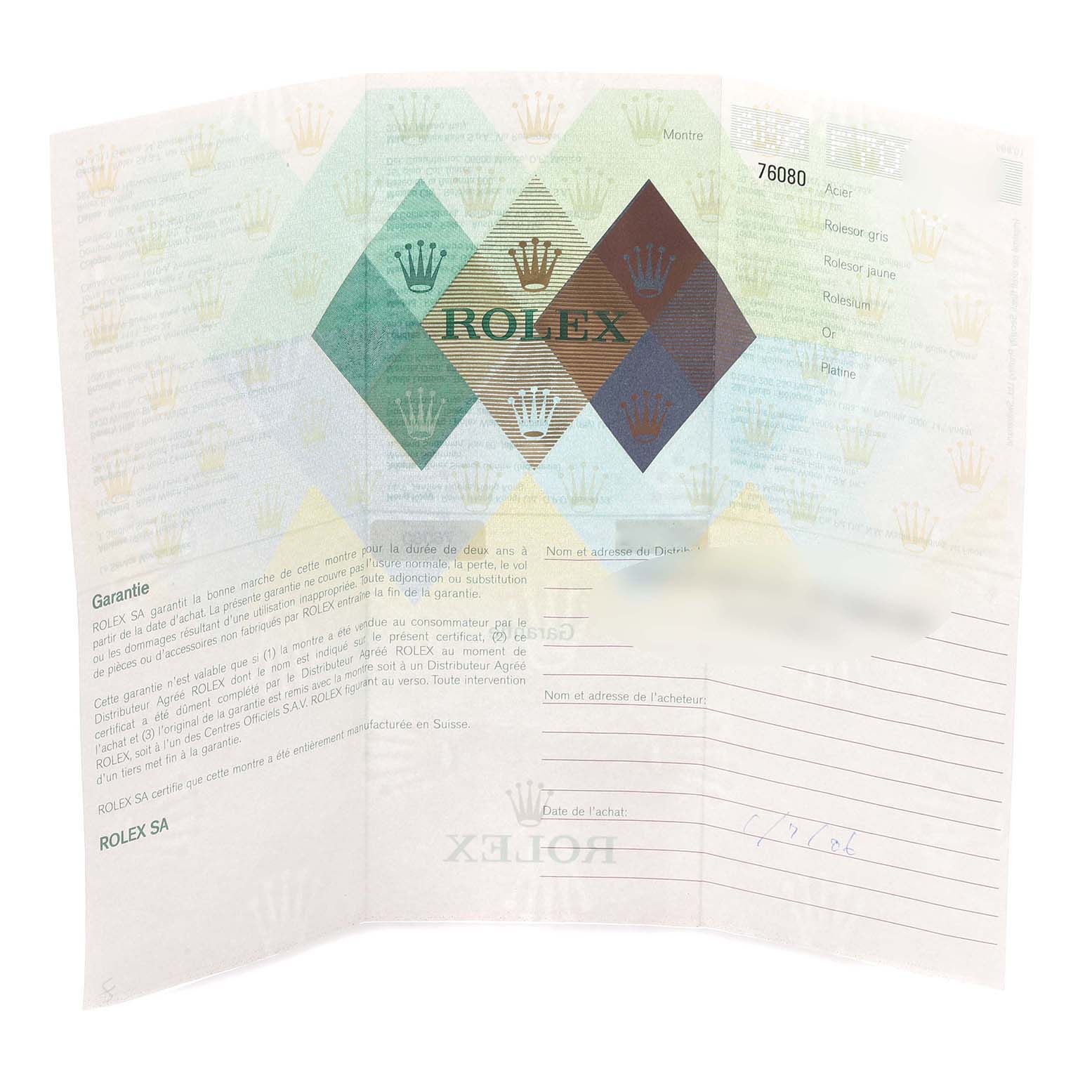 The image shows a Rolex warranty certificate for the Oyster Perpetual model, laid out flat and fully visible.