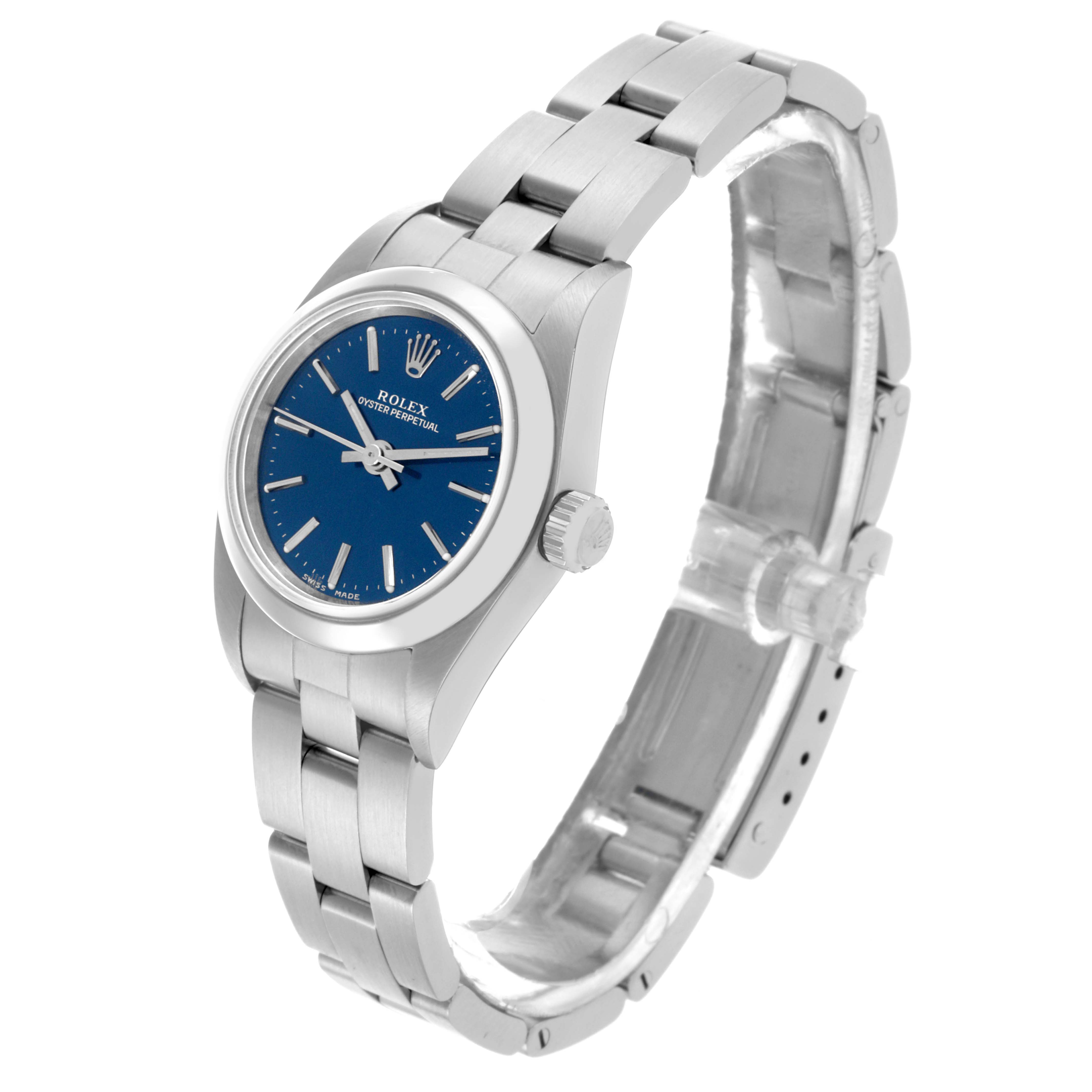 The Rolex Oyster Perpetual 76080 Women's Stainless Steel Blue Dial 76080 Women's Stainless Steel Blue Dial watch is shown in a three-quarter view, displaying the bracelet, bezel, crown, and blue dial.