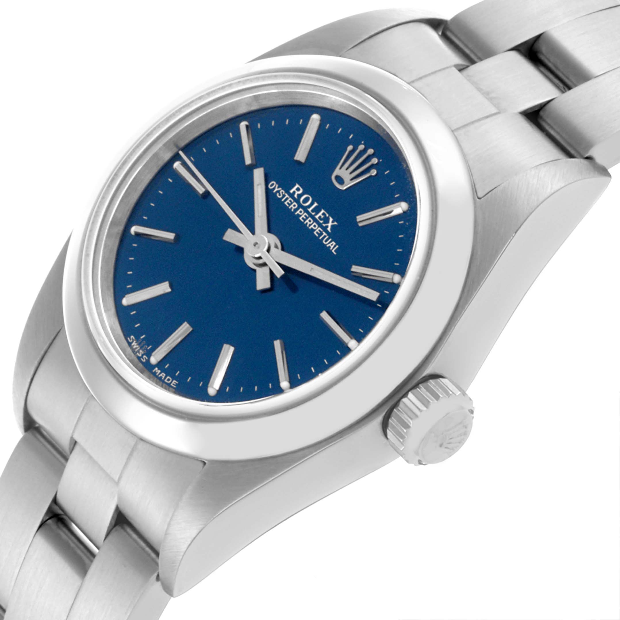 The image shows a side angle of the Rolex Oyster Perpetual 76080 Women's Stainless Steel Blue Dial 76080 Women's Stainless Steel Blue Dial, highlighting the blue dial, crown, and part of the bracelet.