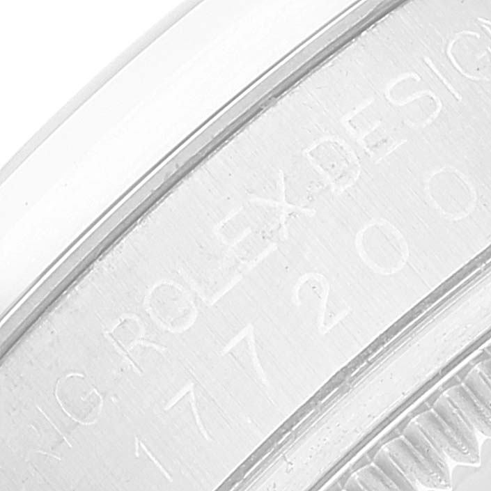 The image shows a close-up of the engraving on the back case of a Rolex Mid-Size 177200 Women
s Stainless Steel Blue Dial 177200 Women
s Stainless Steel Blue Dial model watch.