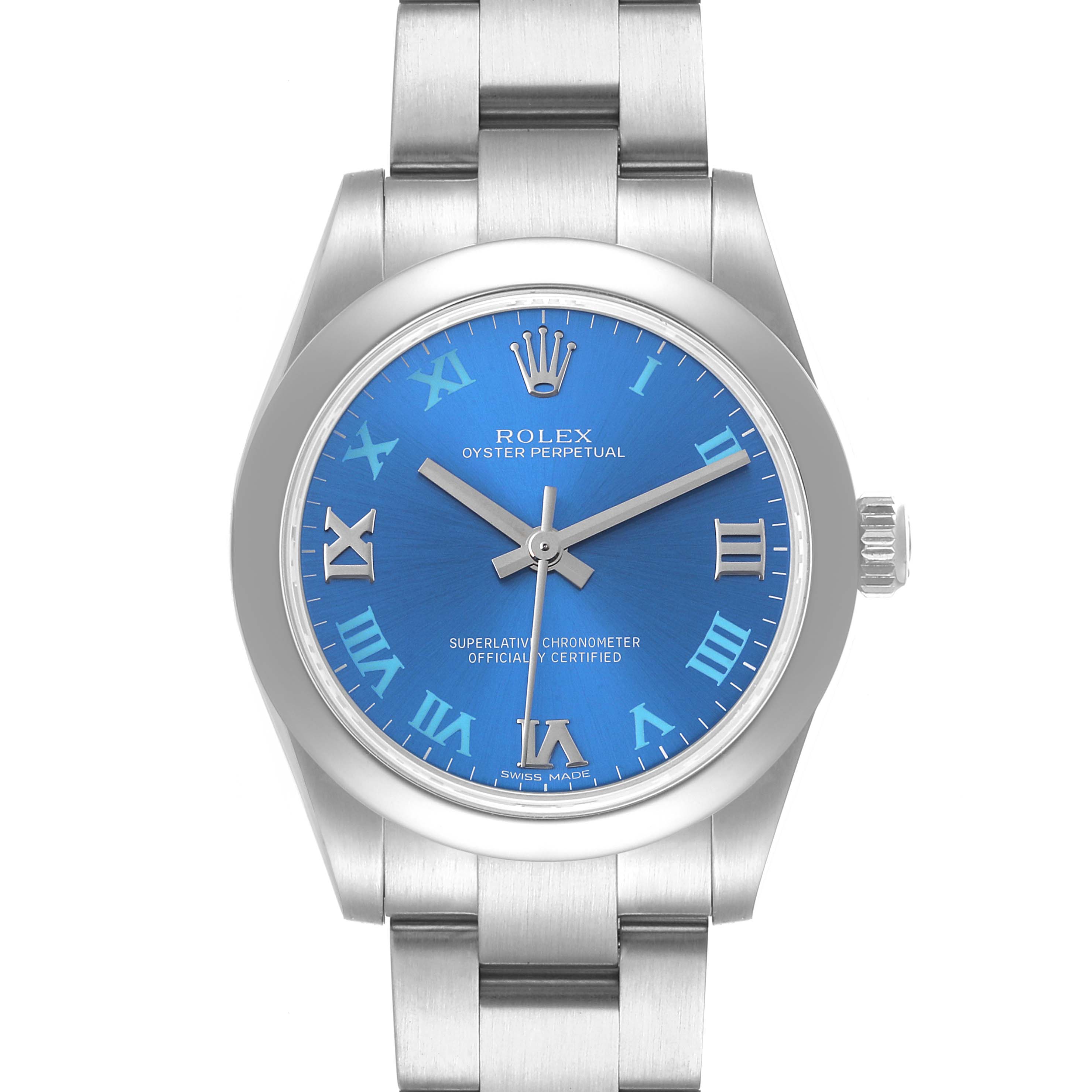 The image shows the front view of a Rolex Oyster Perpetual Mid-Size watch with a blue dial and silver Roman numerals.