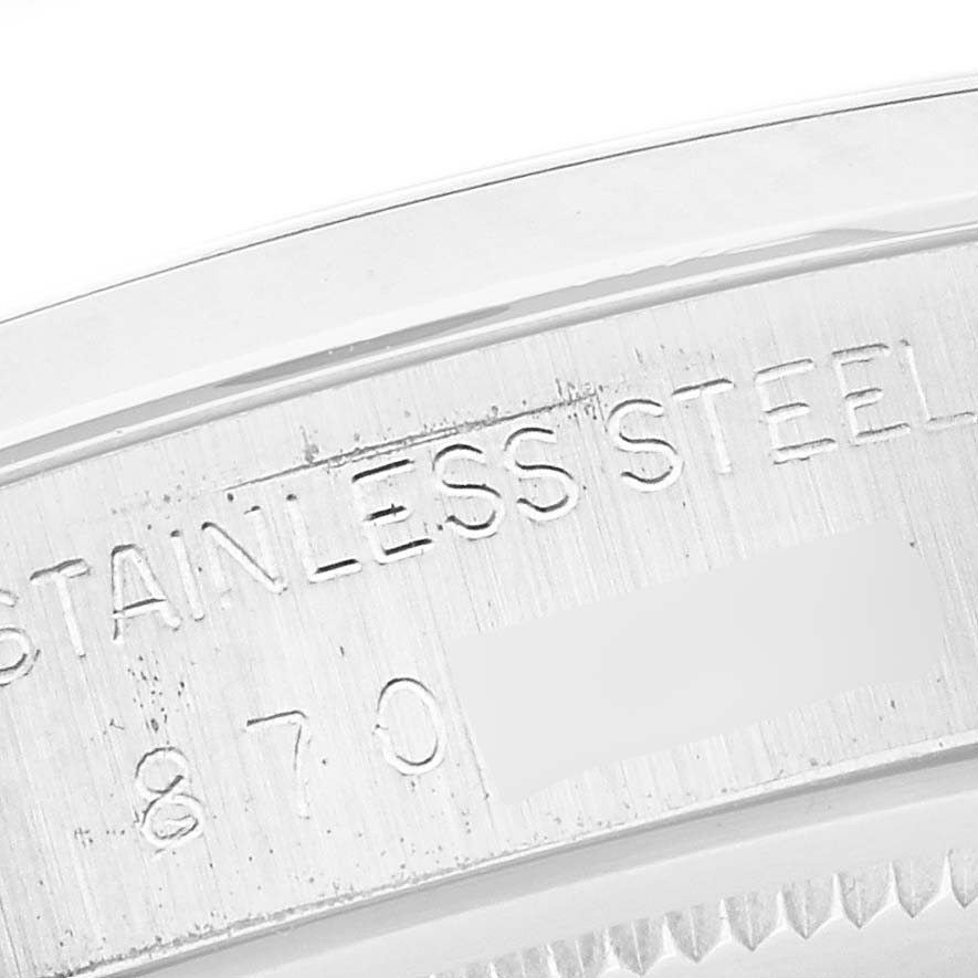 The image shows a close-up of the stainless steel engraving on the back of a Rolex Date 6694 Men's Stainless Steel Silver Dial 6694 Men's Stainless Steel Silver Dial model watch.