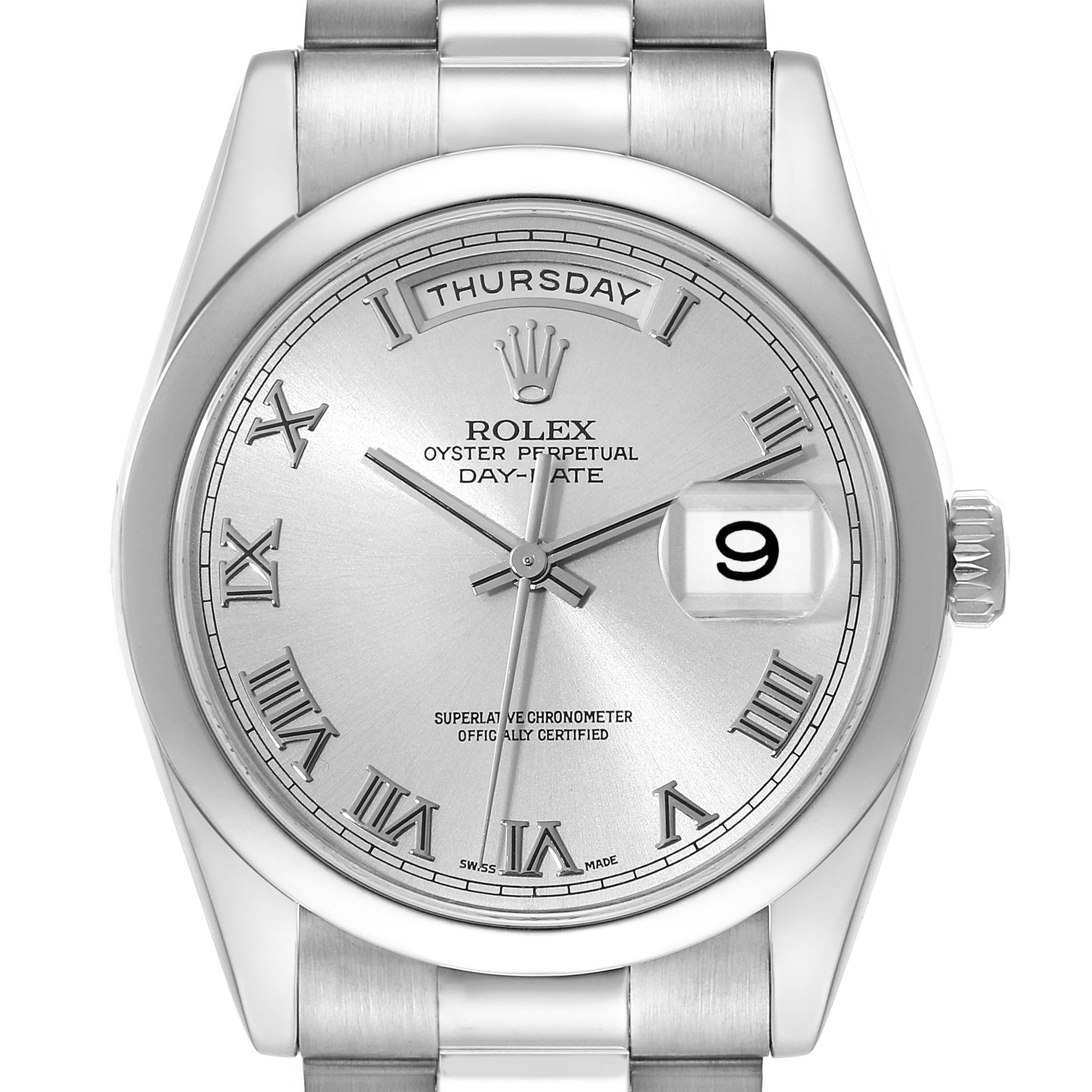The image shows a front view of a Rolex President 118209 Men's White Gold Silver Dial 118209 Men's White Gold Silver Dial model watch, featuring the dial, hands, day, and date indicators.