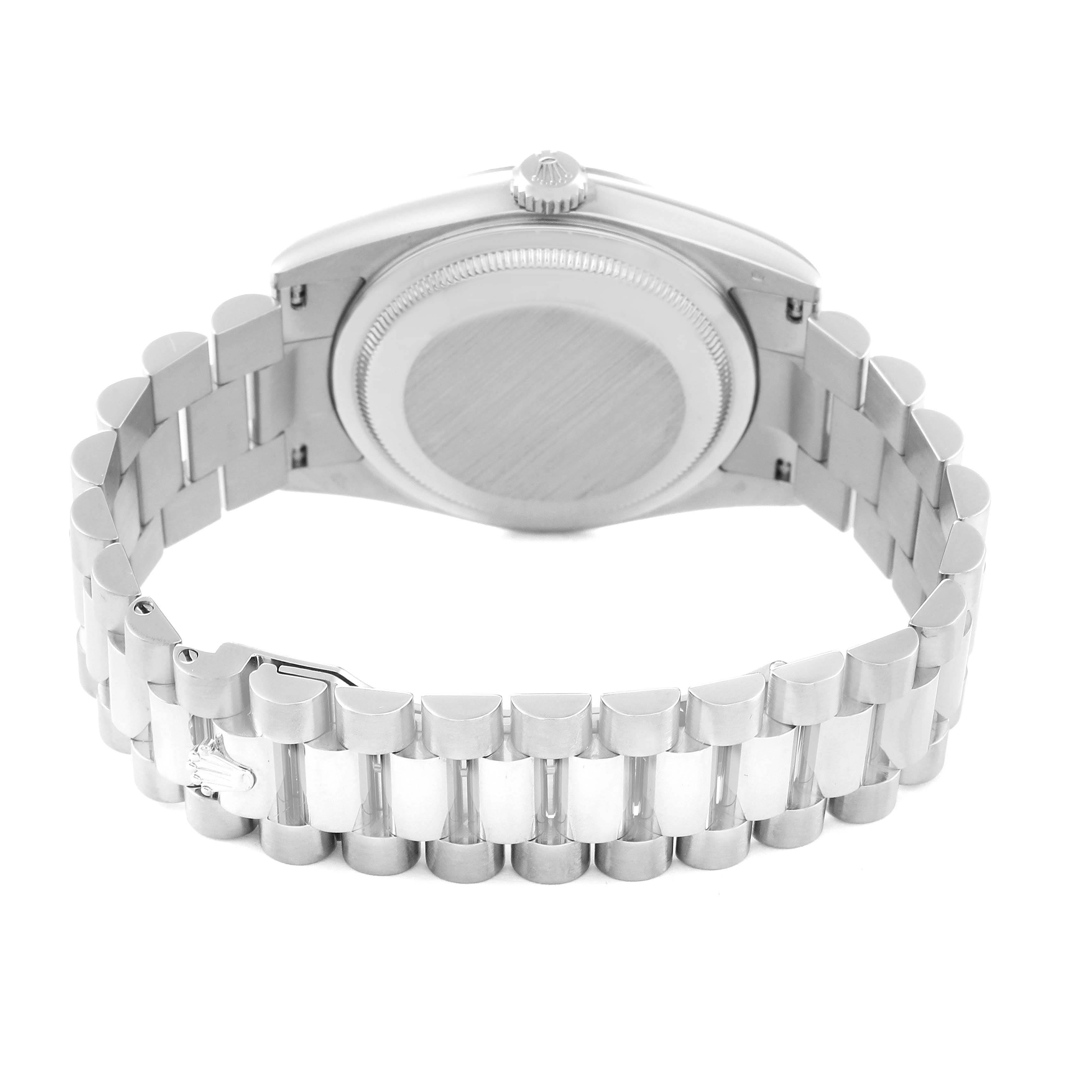 The image shows the back view of a Rolex President 118209 Men's White Gold Silver Dial 118209 Men's White Gold Silver Dial model watch, highlighting the case back and part of the metal bracelet.
