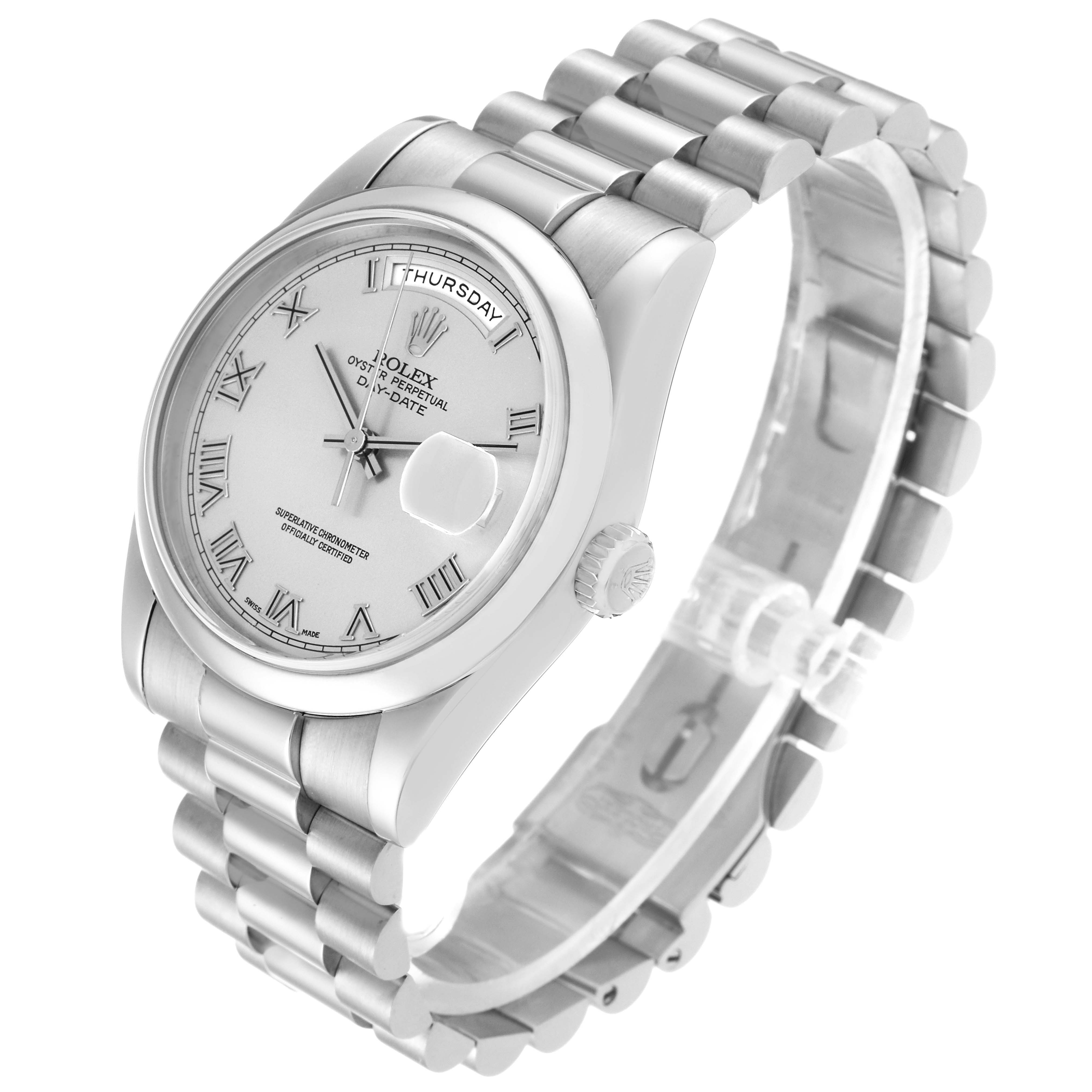 The Rolex President 118209 Men's White Gold Silver Dial 118209 Men's White Gold Silver Dial model watch is displayed at a slight angle, showing its dial, bracelet, crown, and part of the side of its case.