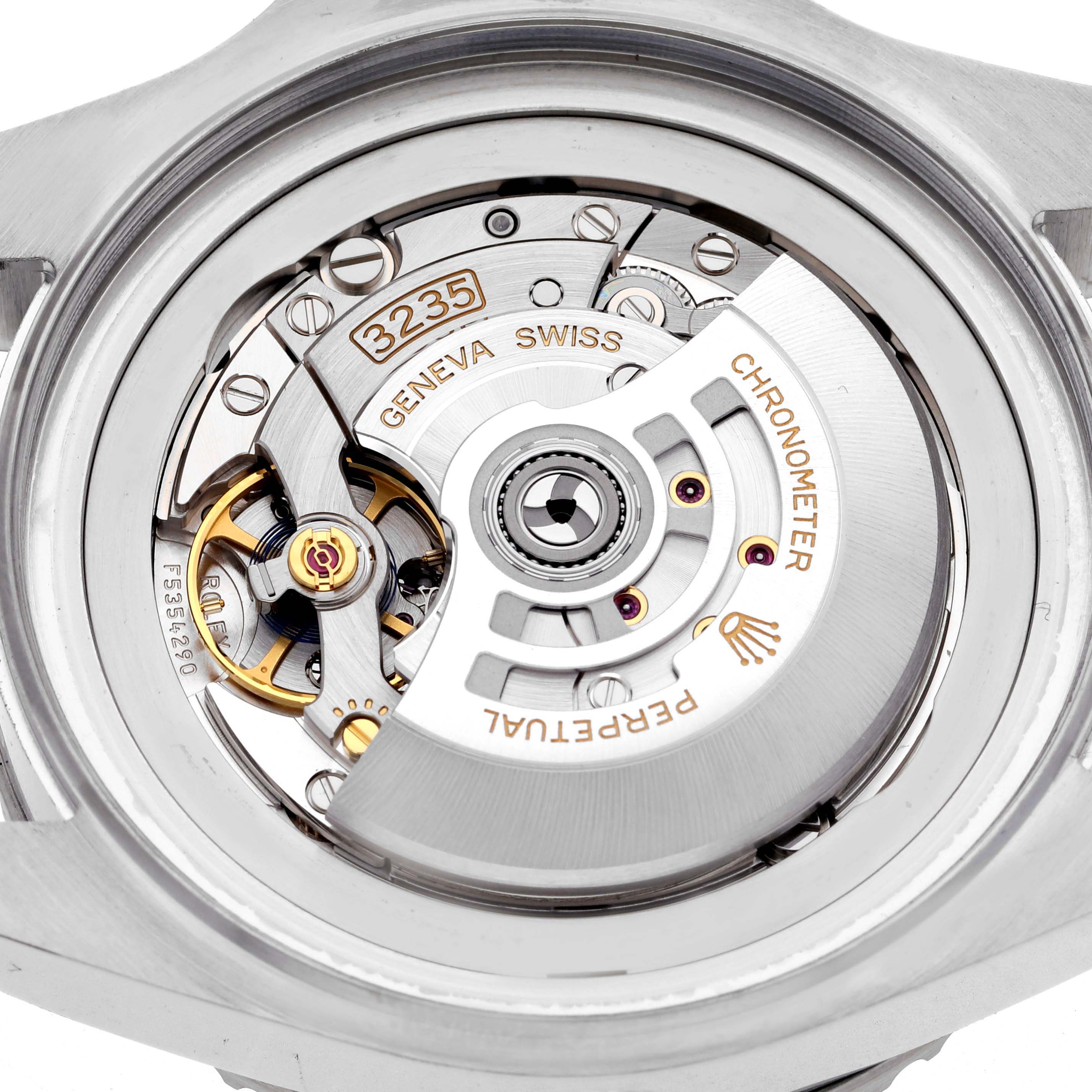 The image shows the open back view of a Rolex Sea-Dweller M136660-0005 Men's Stainless Steel Blue Dial M136660-0005 Men's Stainless Steel Blue Dial, highlighting its internal movement and mechanism parts.