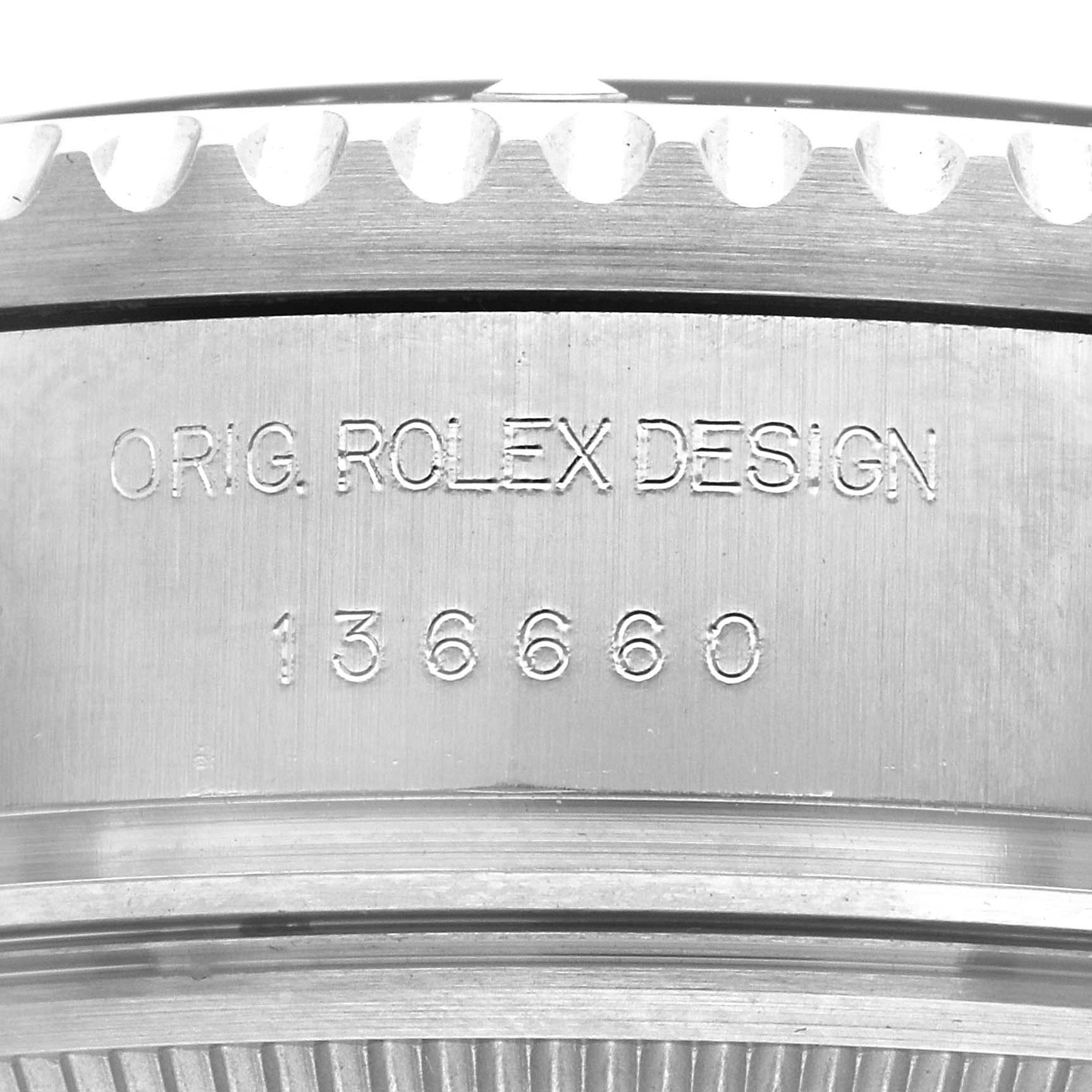 The image shows a close-up of the case side with engravings for the Rolex Sea-Dweller M136660-0005 Men's Stainless Steel Blue Dial M136660-0005 Men's Stainless Steel Blue Dial model.